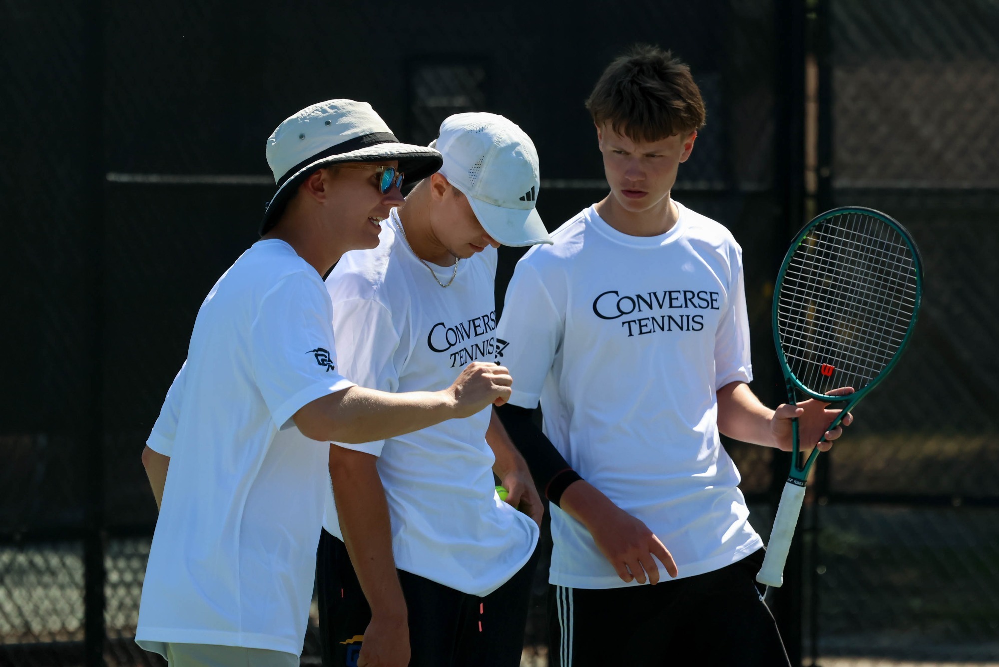 Coach James Smith coaches two players