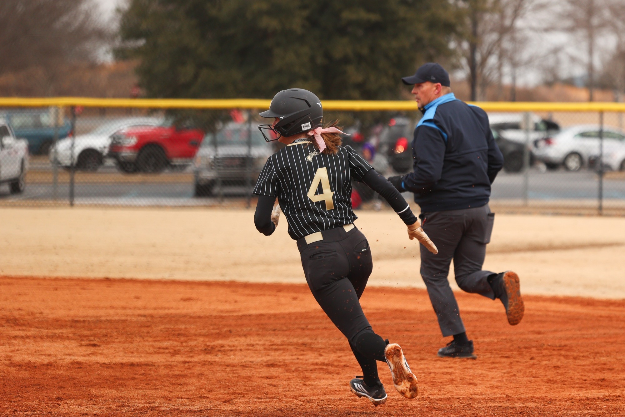 Aubree Leonard rounds first base