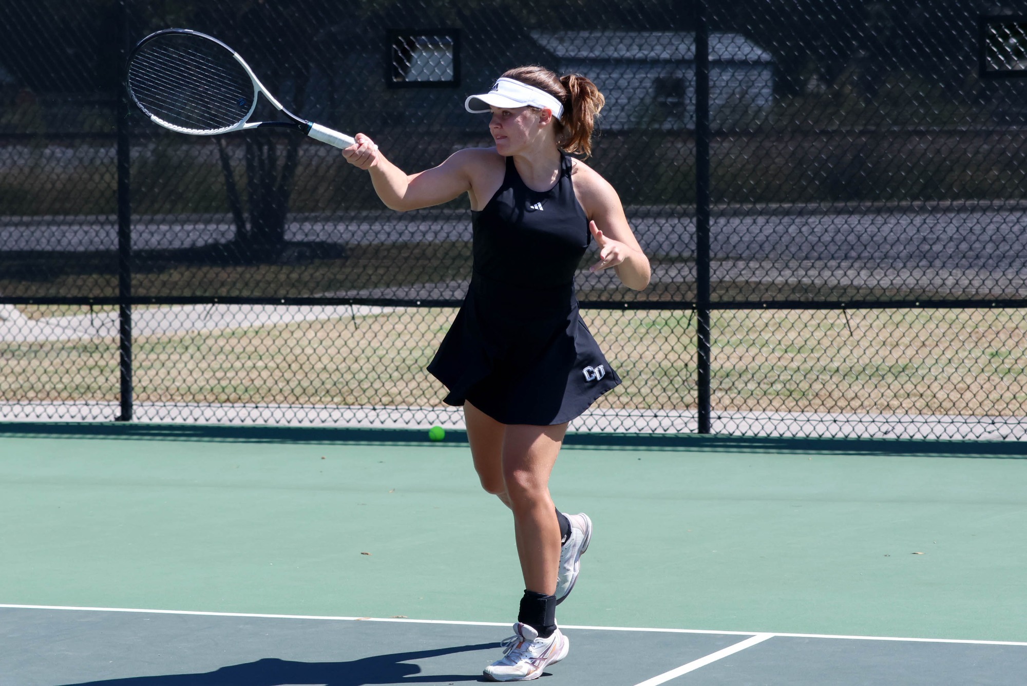 Romy Rueff returns a forehand against Newberry