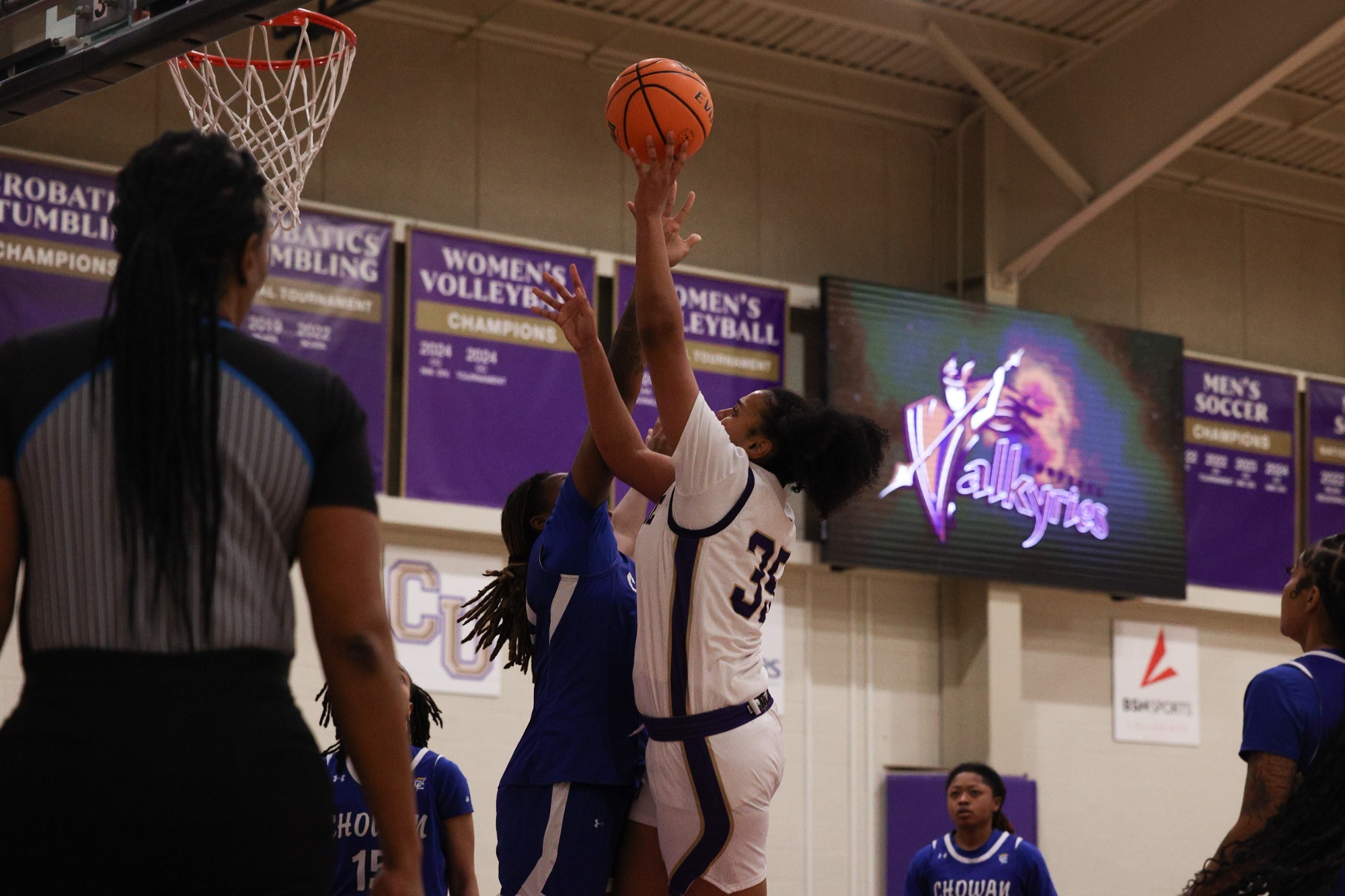 Tatiana Brown goes for a shot over a Chowan defender