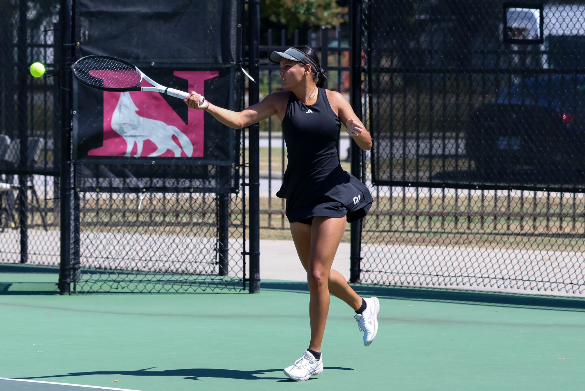 Khuski Kharb hits a forehand