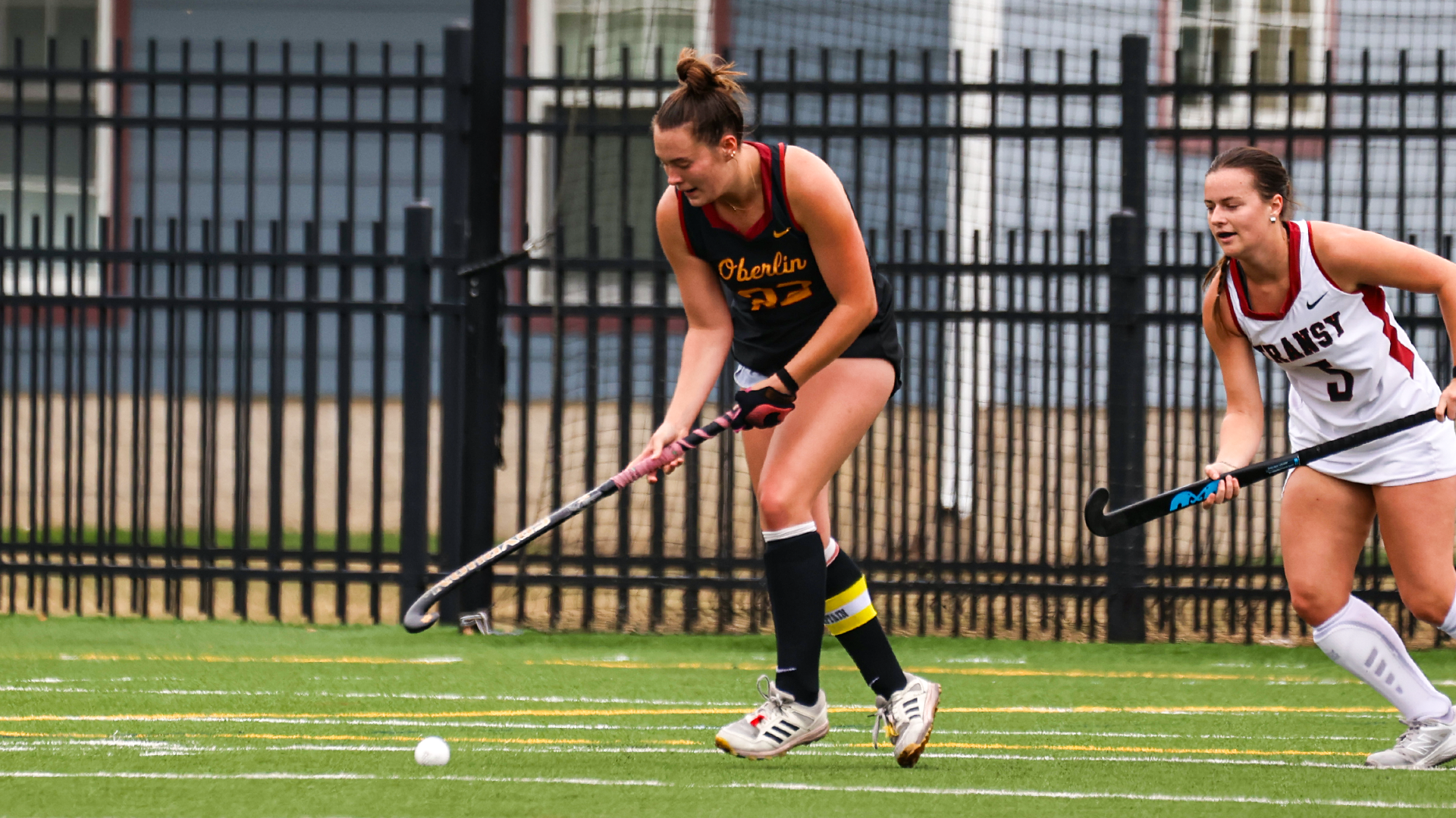 Elly Scheer dribbles the ball down the field 