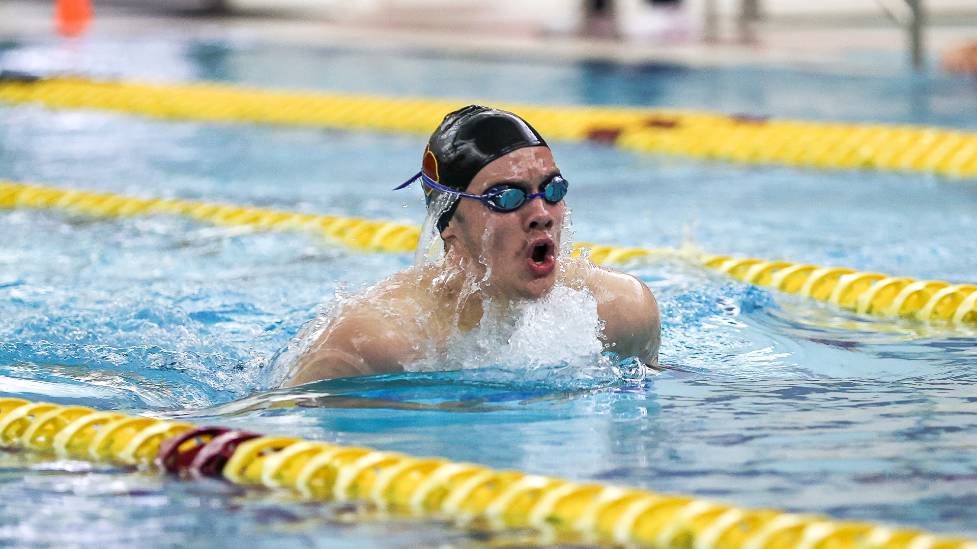 Leo Powers surfacing the water for air during breaststroke