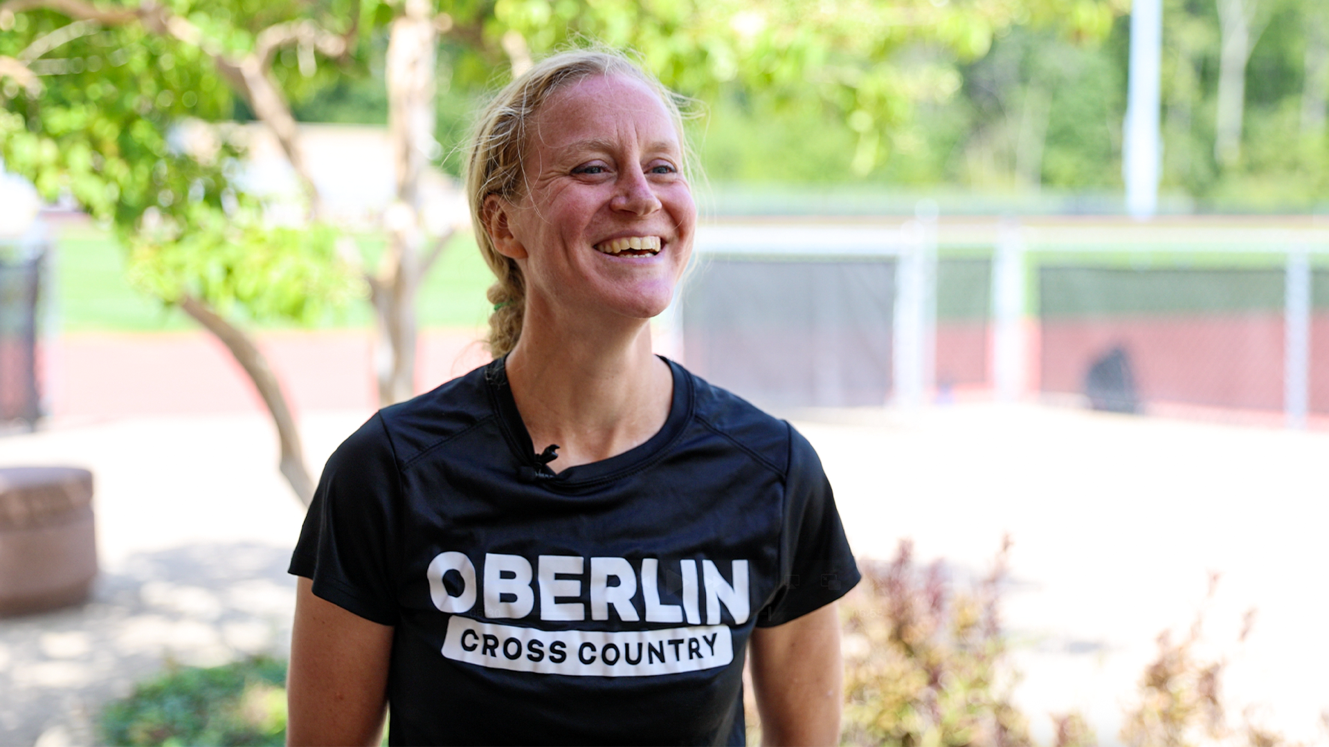 Izzy Alexander smiling at the camera