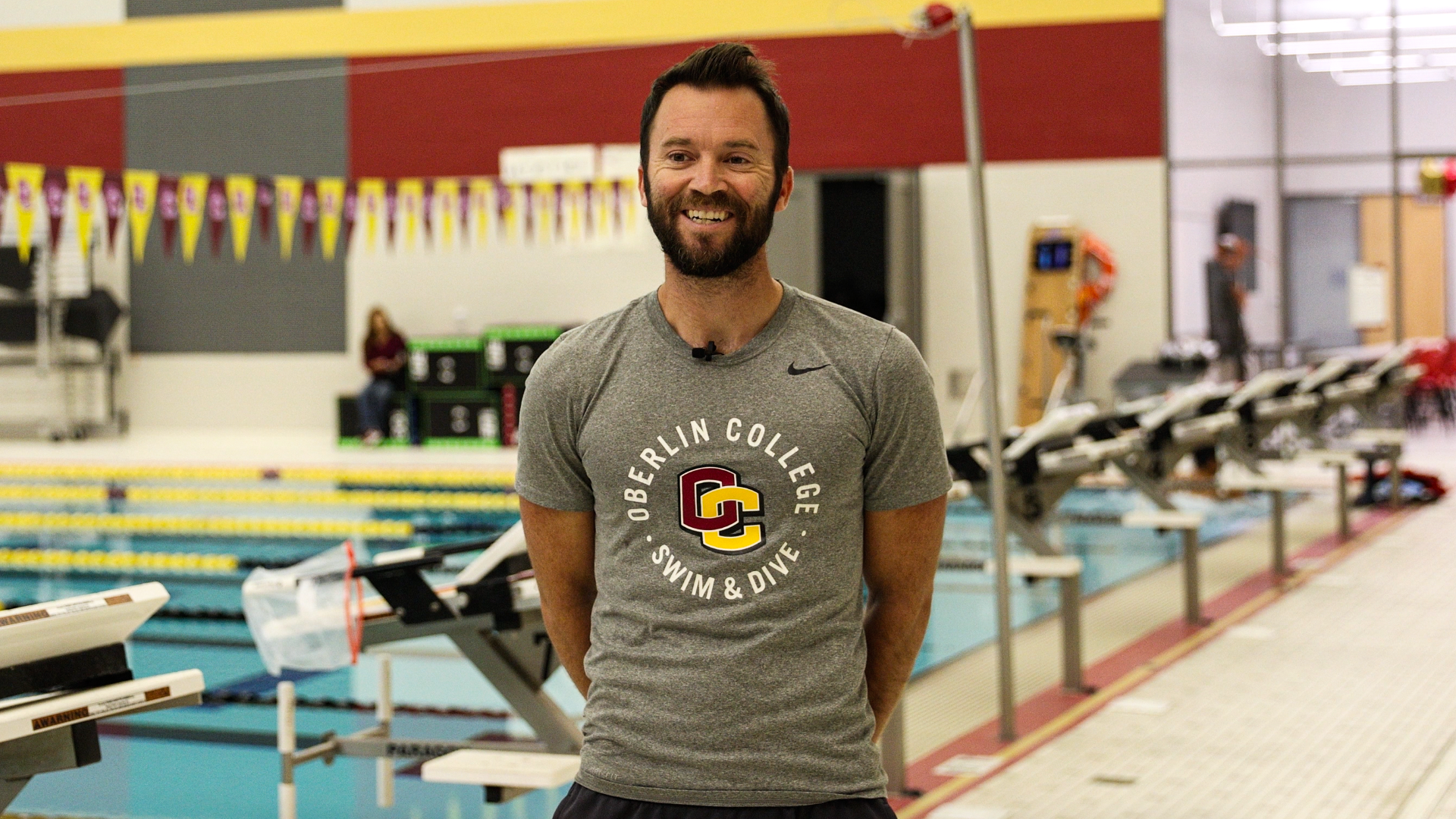 Alex de la Peña smiling at the camera