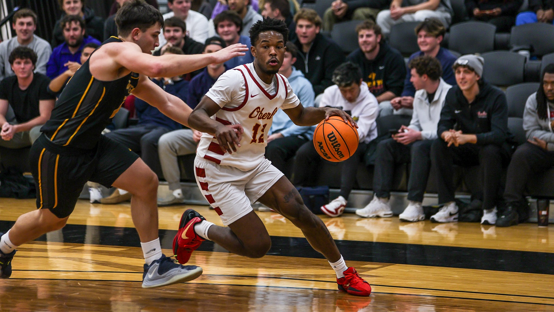 Zach Smith dribbling the ball down the court