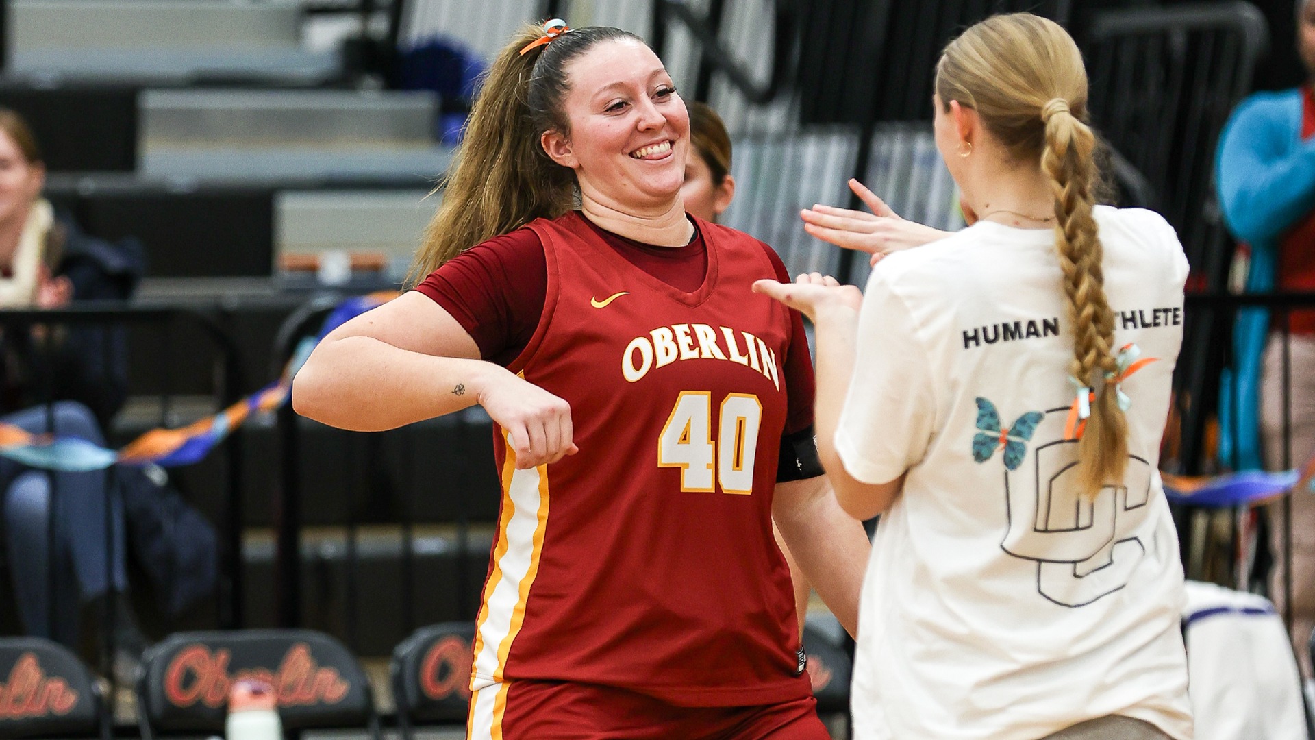 Katherine Csiszar smiling with a teammate