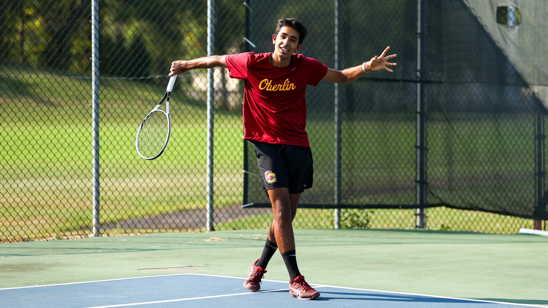 Zain Makada following through on a backhand