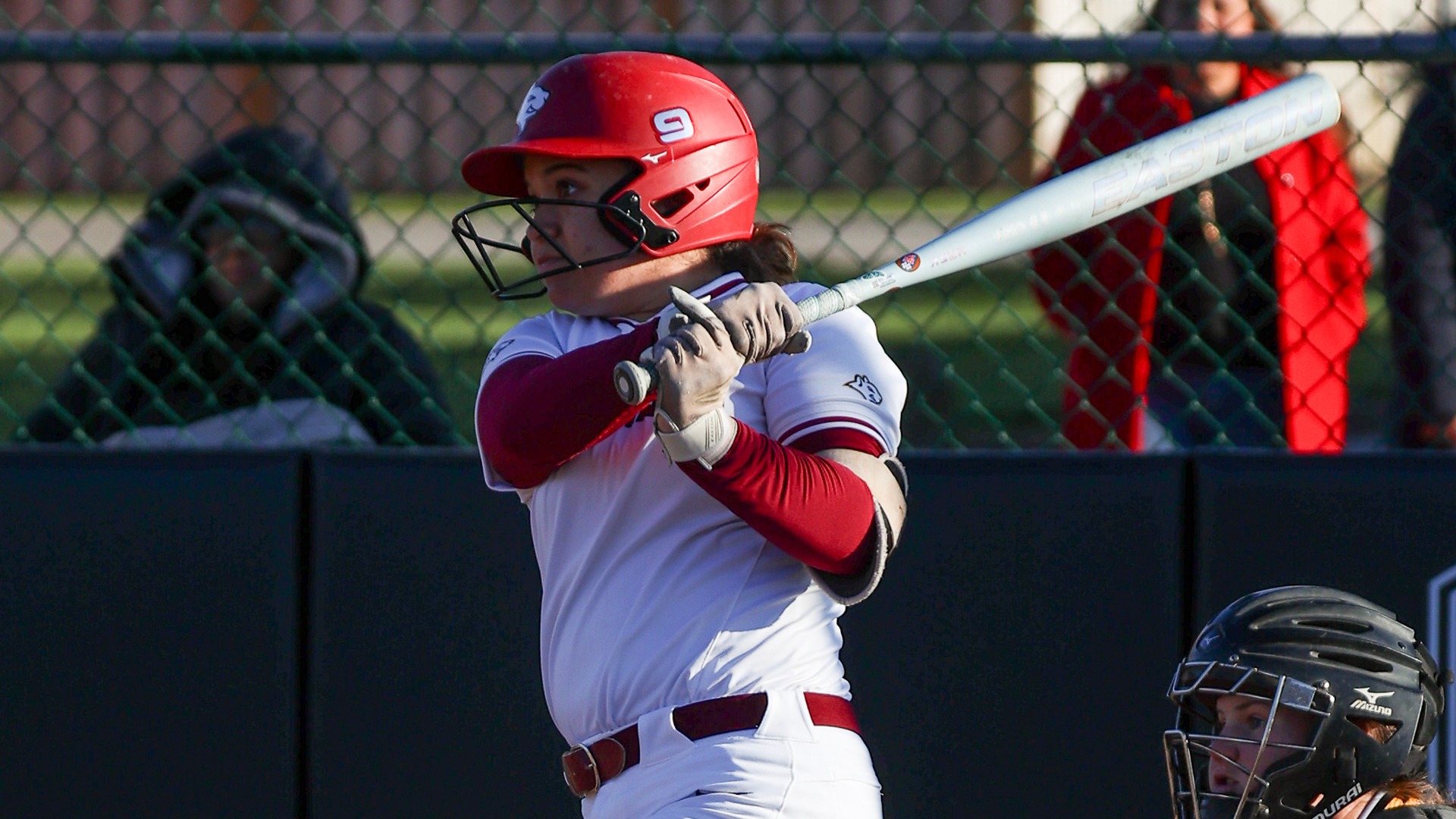 Haley Carlson hitting a softball