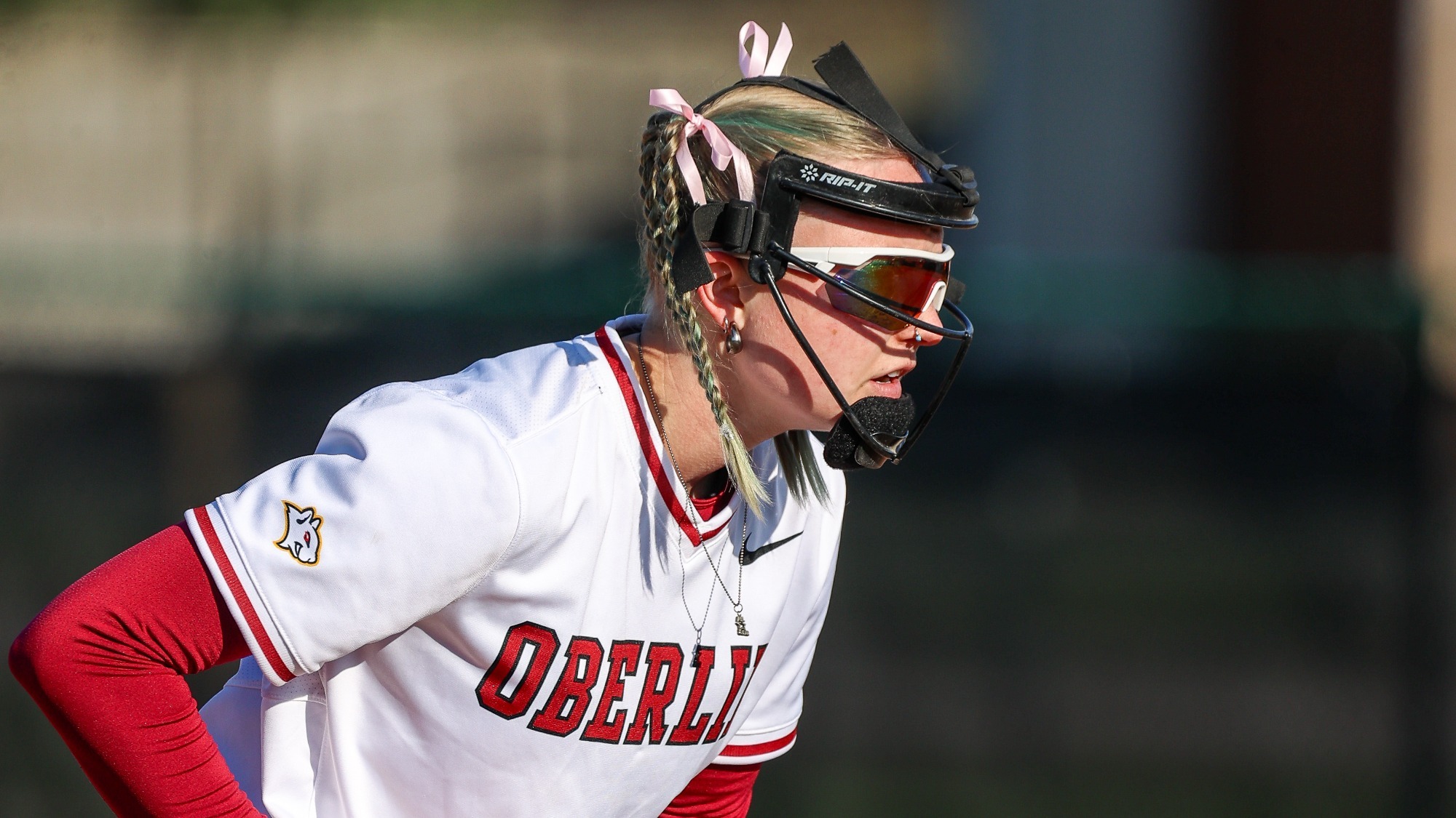 Hailey Alspach staring at batter, about to pitch the ball