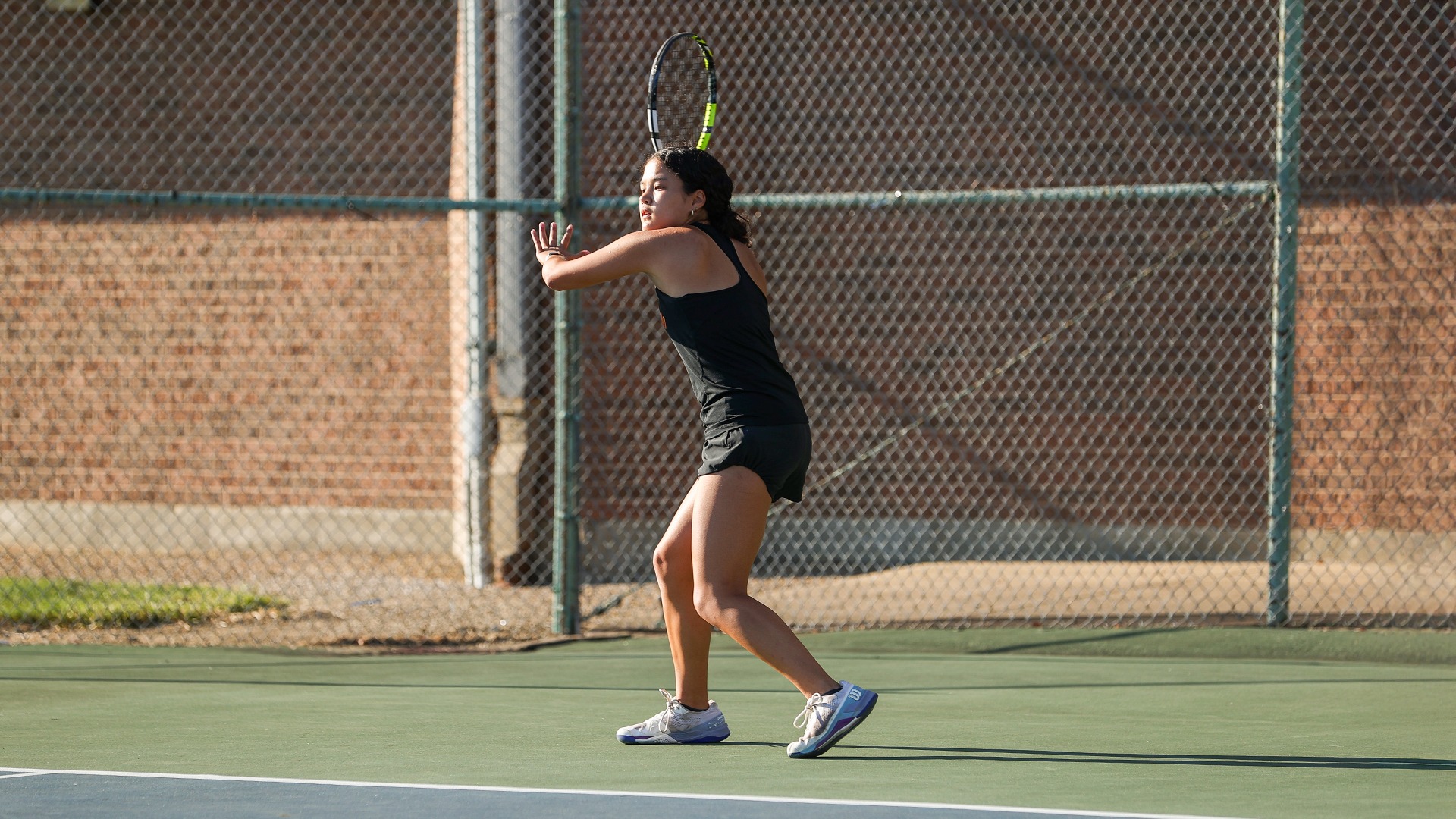 Olivia Wollner hitting a return