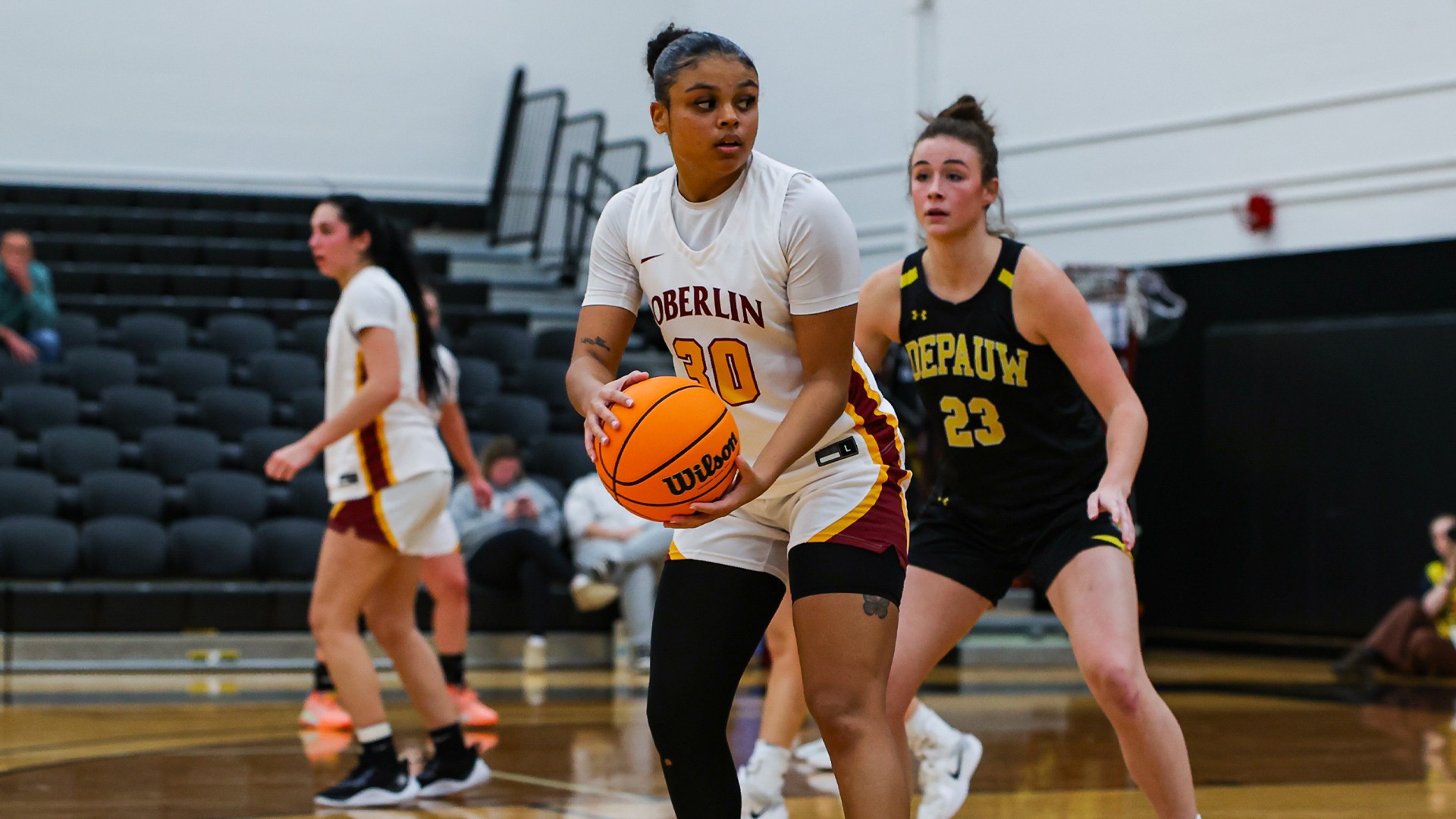 Krystal Montas holding the basketball