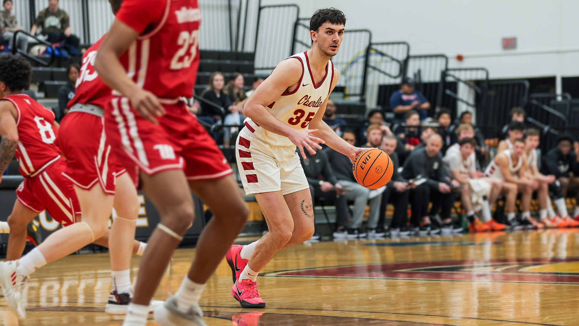 Milun Micanovic dribbling basketball