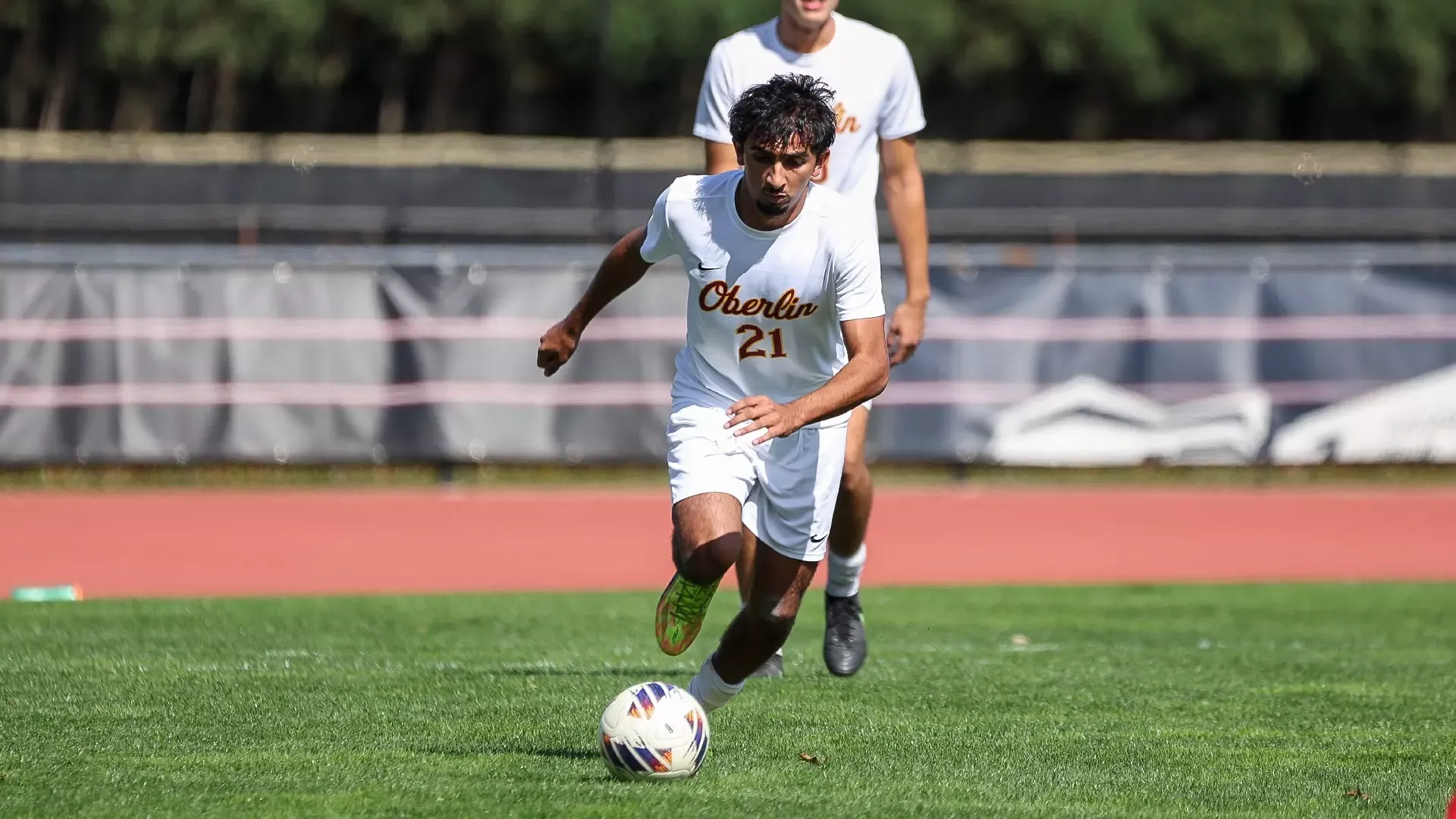 Ishaan Saini running to the soccer ball