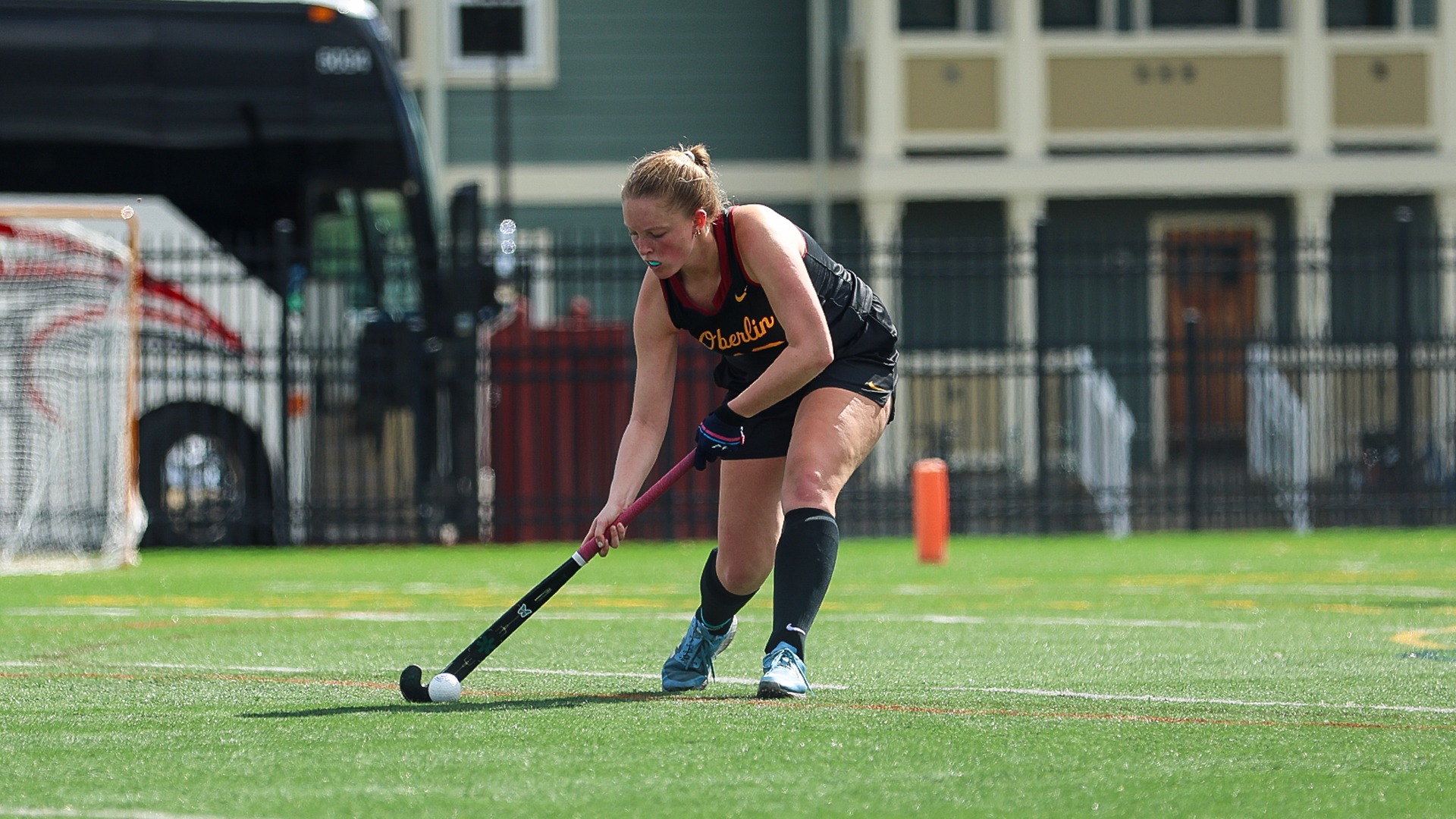 Abby Bruskin hits the field hockey ball