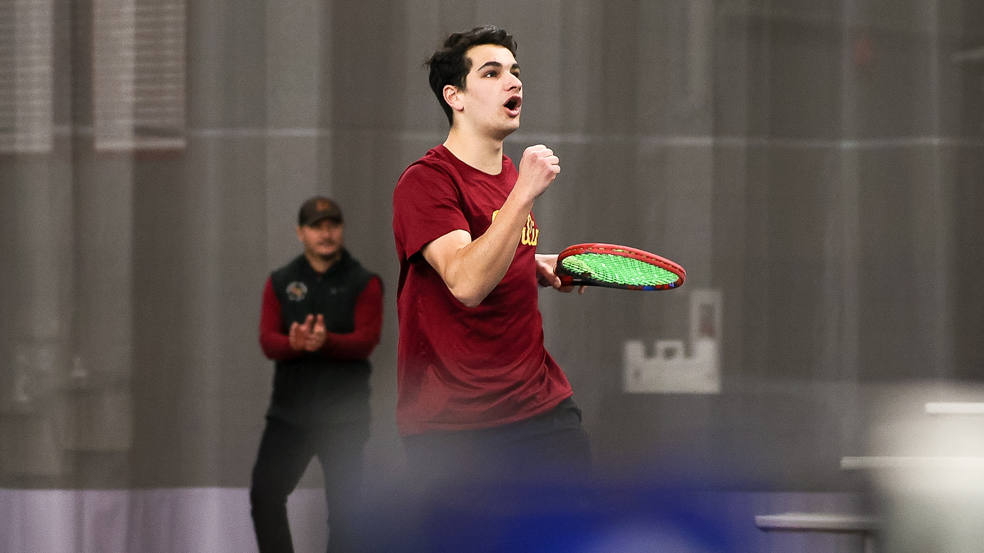 Shawn Lisann cheering after winning a match