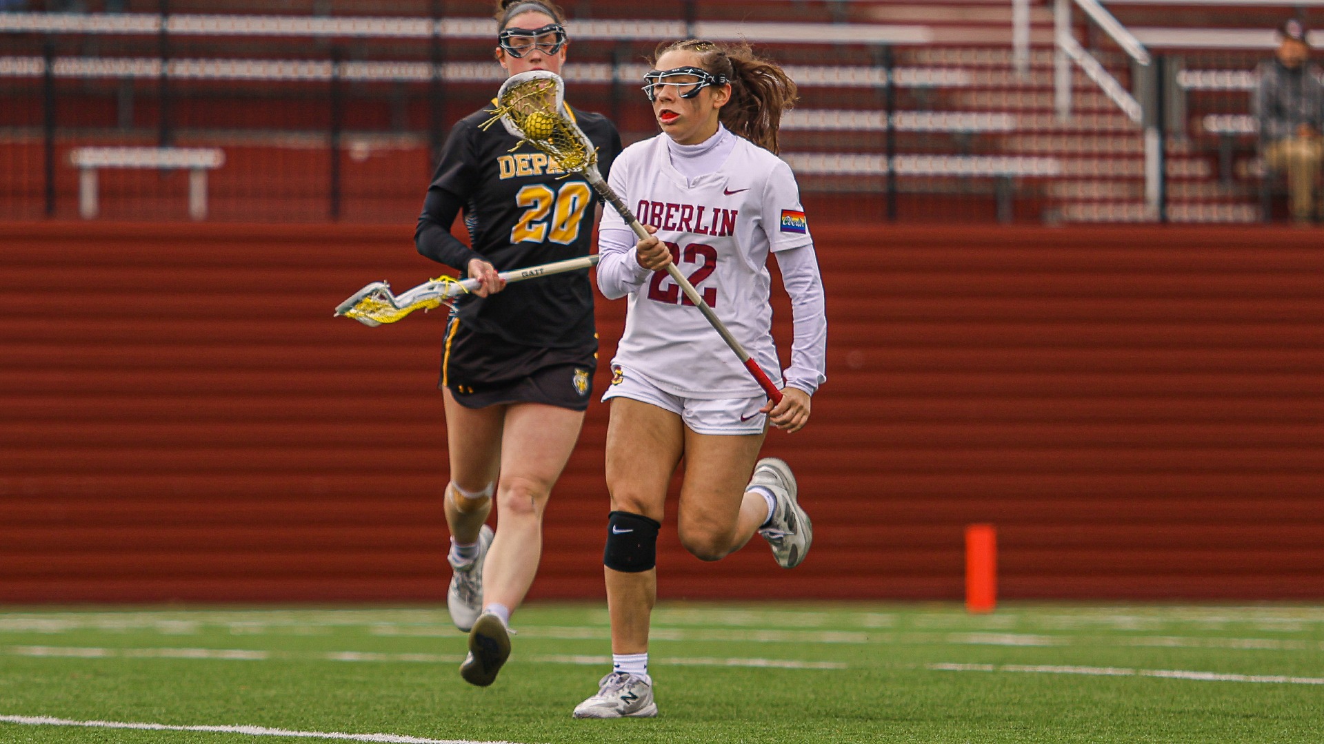 Olivia Corradi runs down the field with the ball