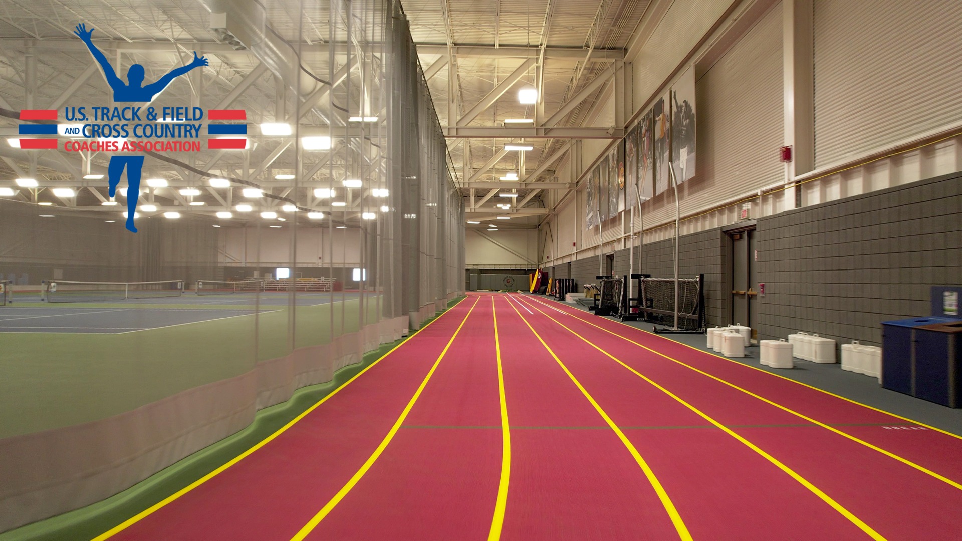 Heisman Field House track with USTFCCCA Logo in top left