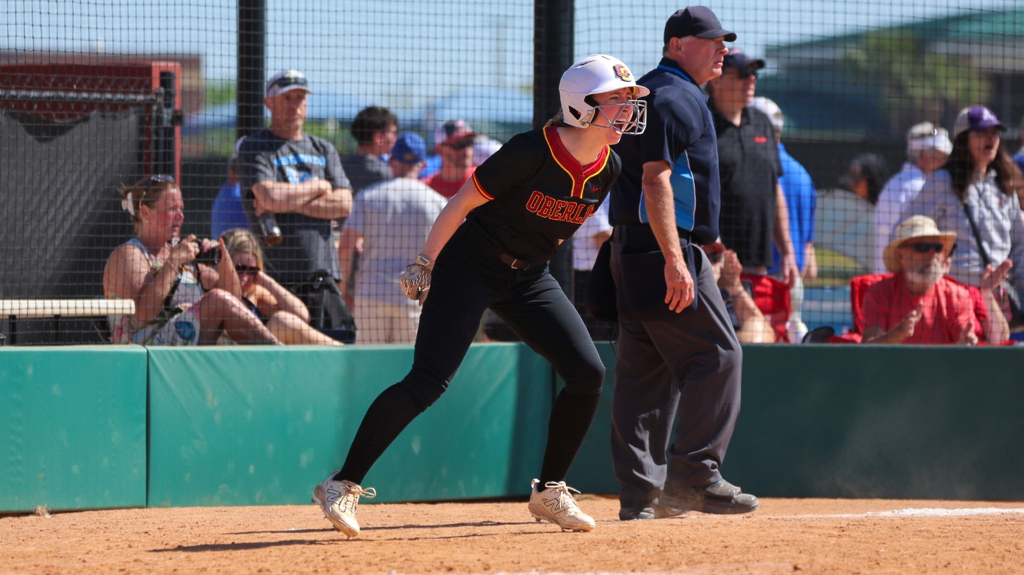 Wren Norris screaming cheering after scoring a run