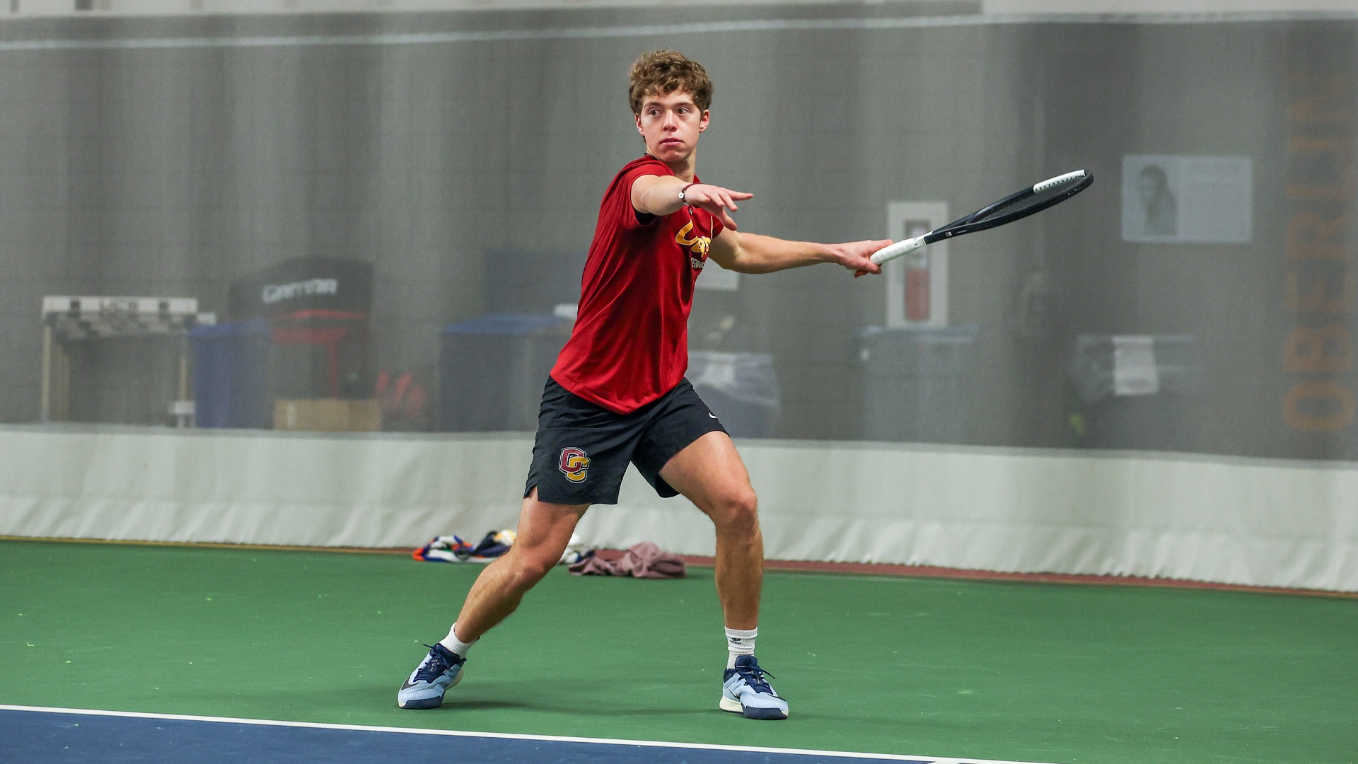 Enrique Margain lining up to hit the tennis ball