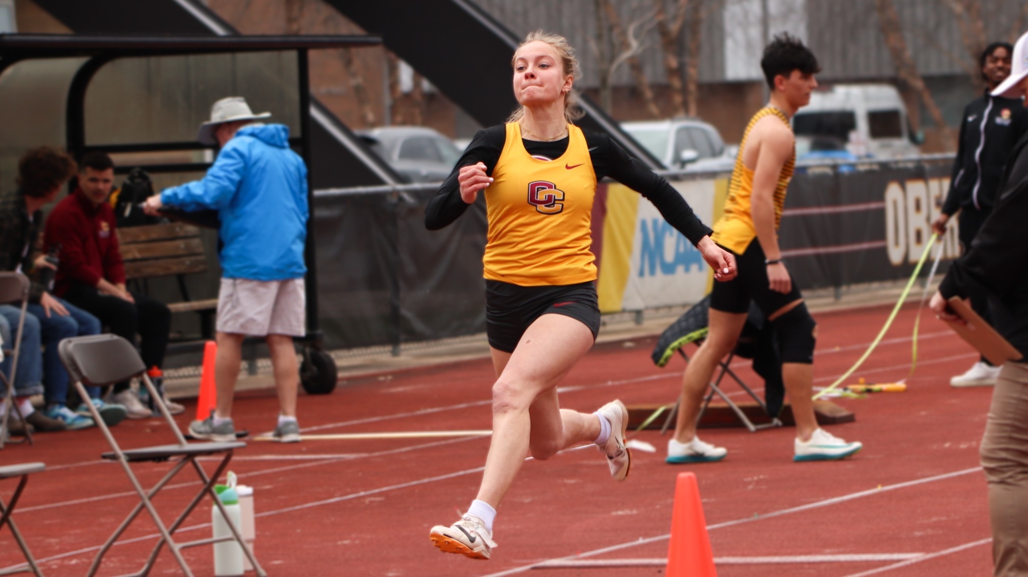 Anna Fritz jumping down the long jump runway