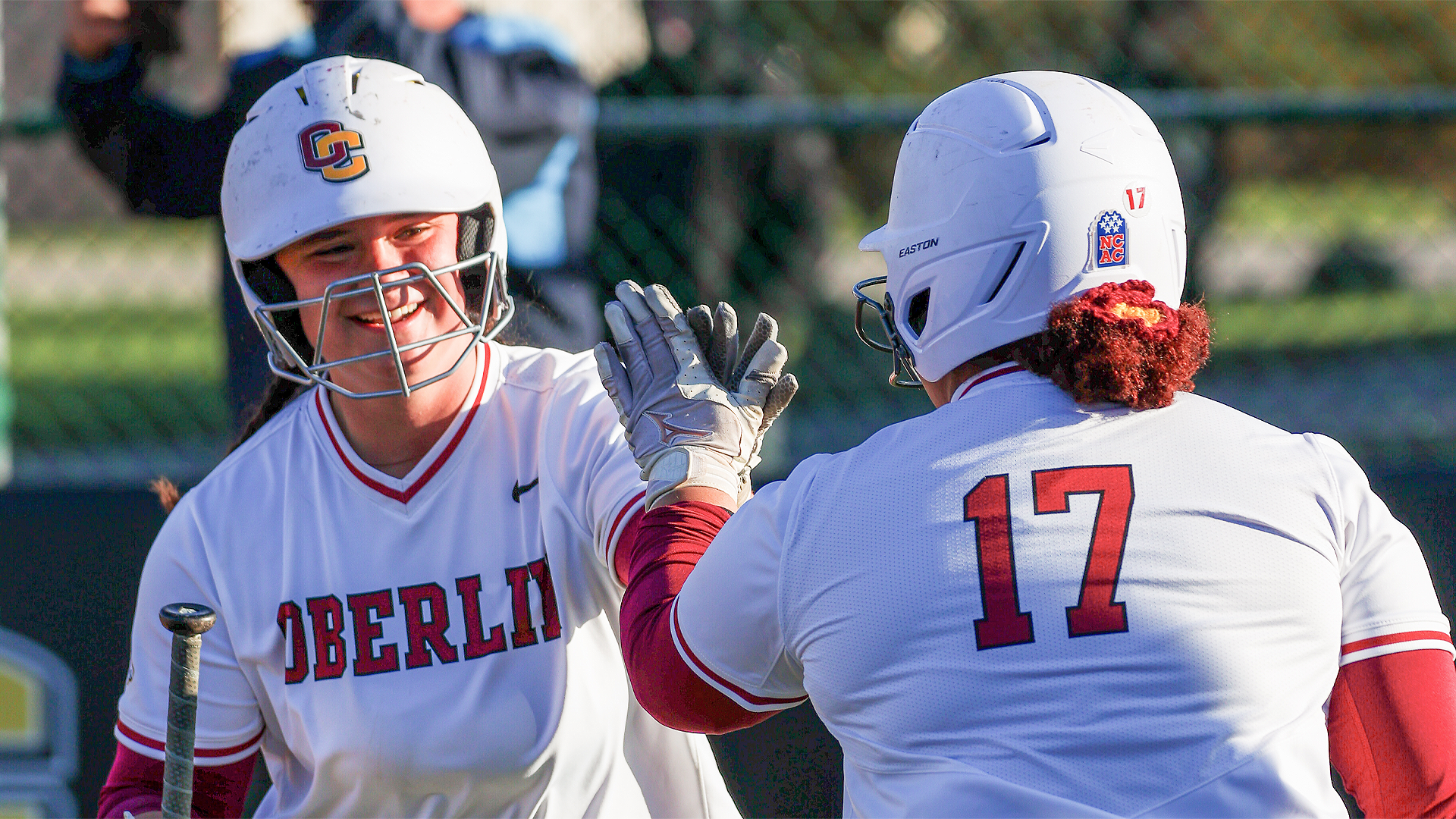 Ava Soldo high-fiving her teammate