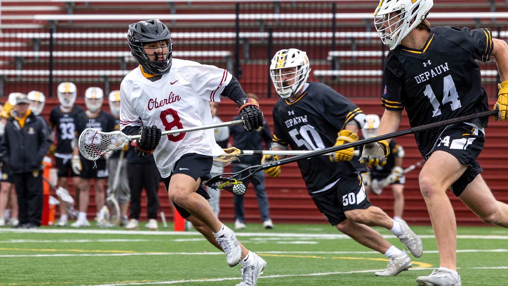 Jackson Lu running down the field to administer defense 