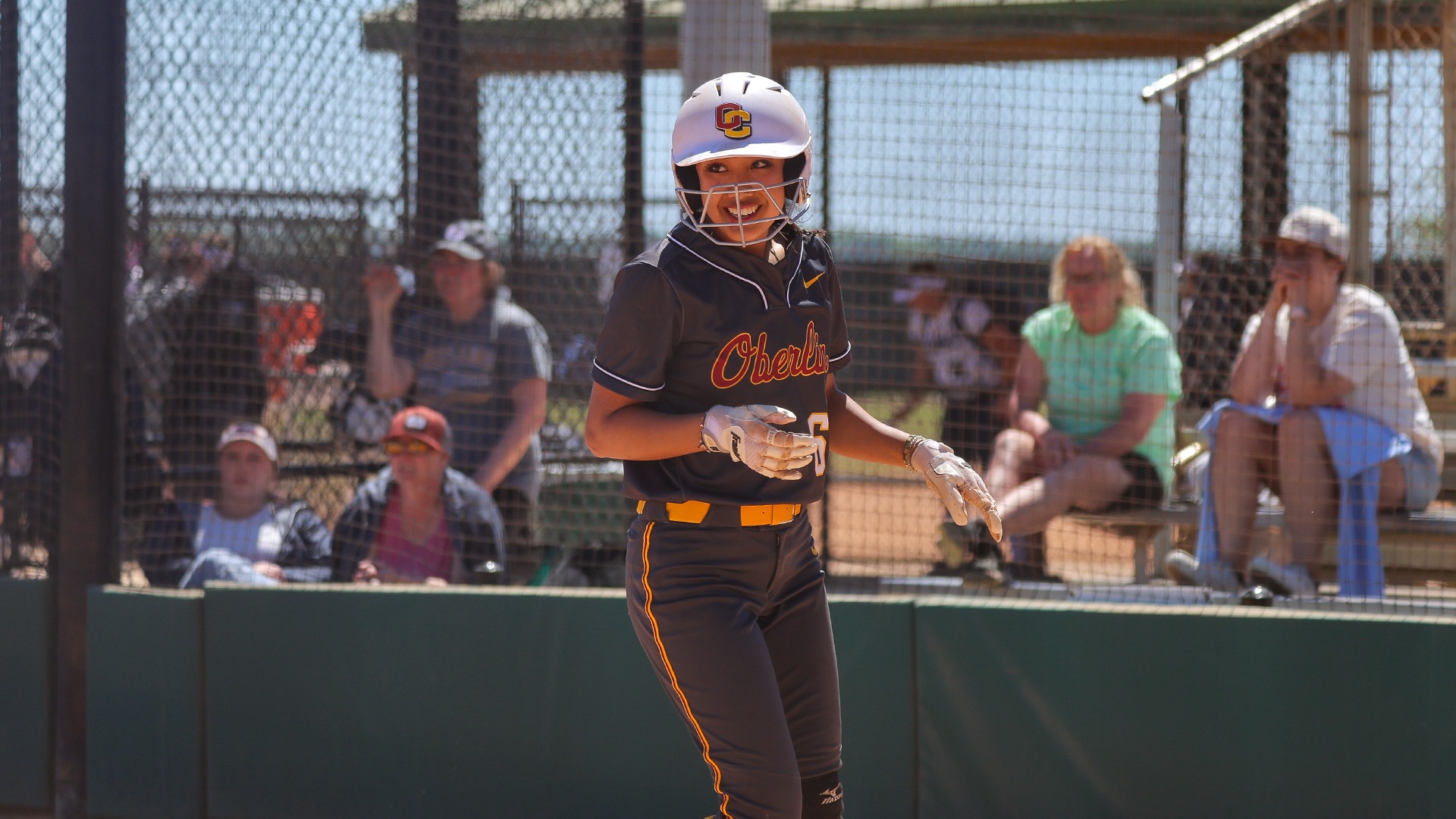 Anjali Singh smiling after crossing home plate