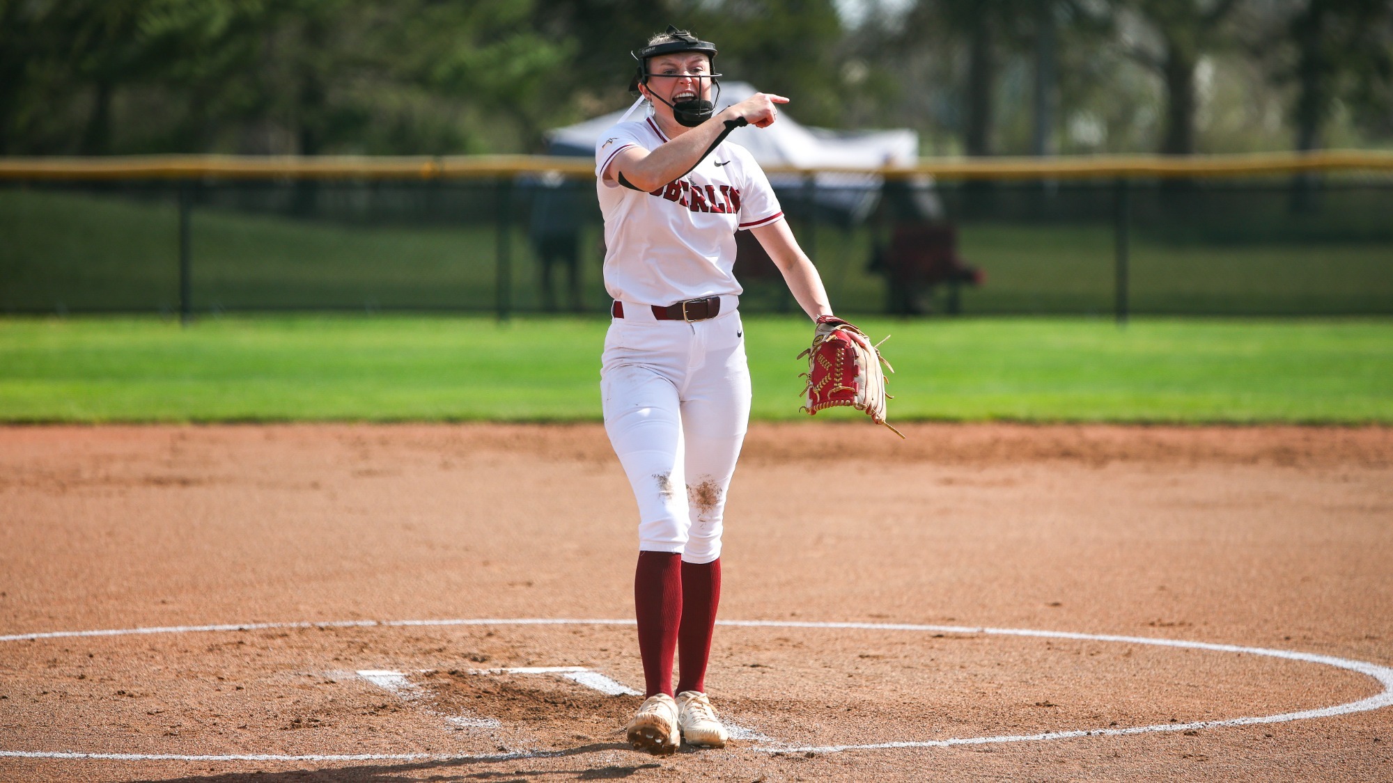 Hailey Alspach pointing a celebrating after getting a strikeout