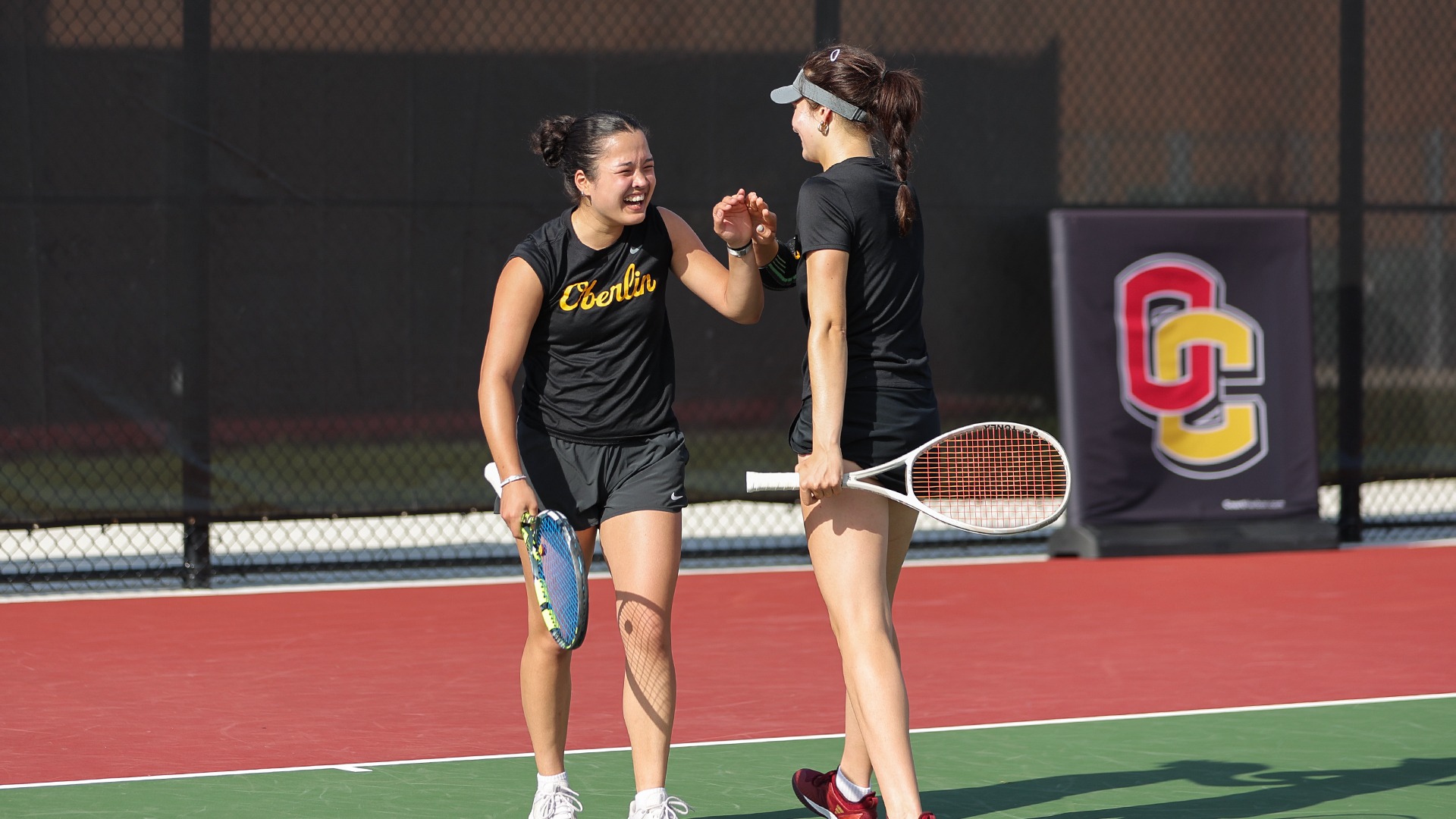 Olivia Wollner and Stella Kollsmansberger celebrating a point