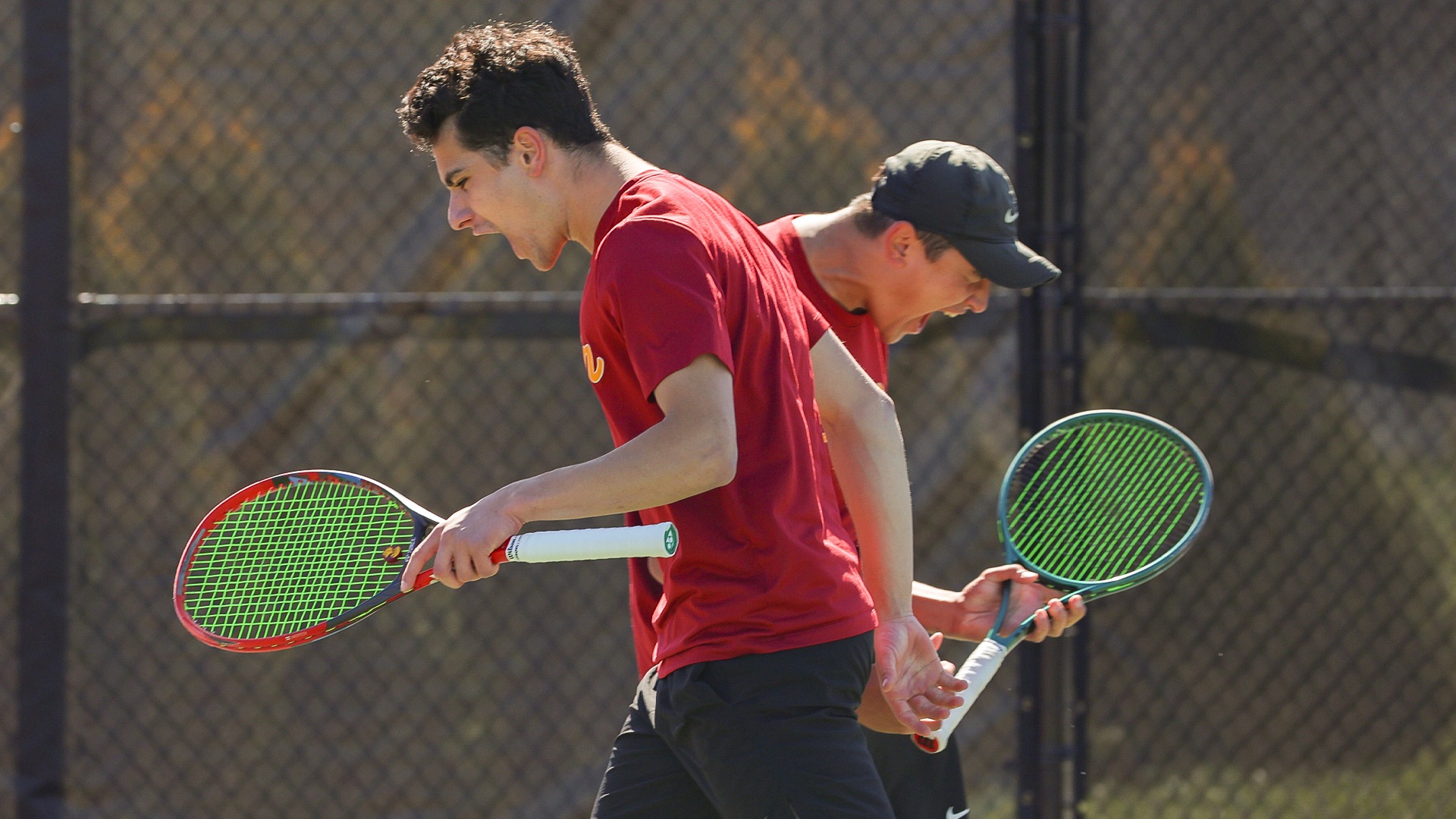 Shawn Lisann and Cameron Weiss cheering and yelling