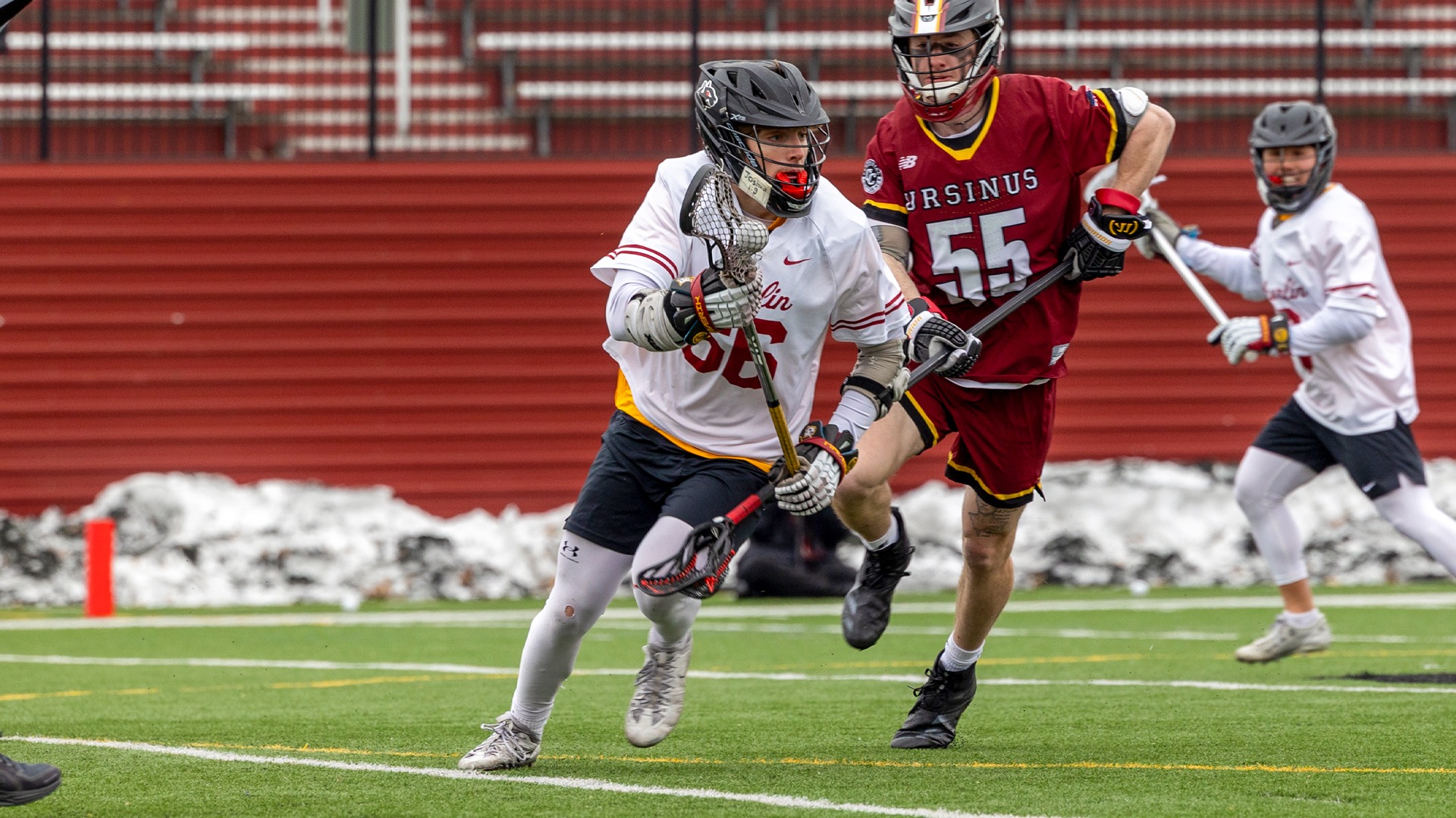 Evan Sardina running with the ball in lacrosse stick
