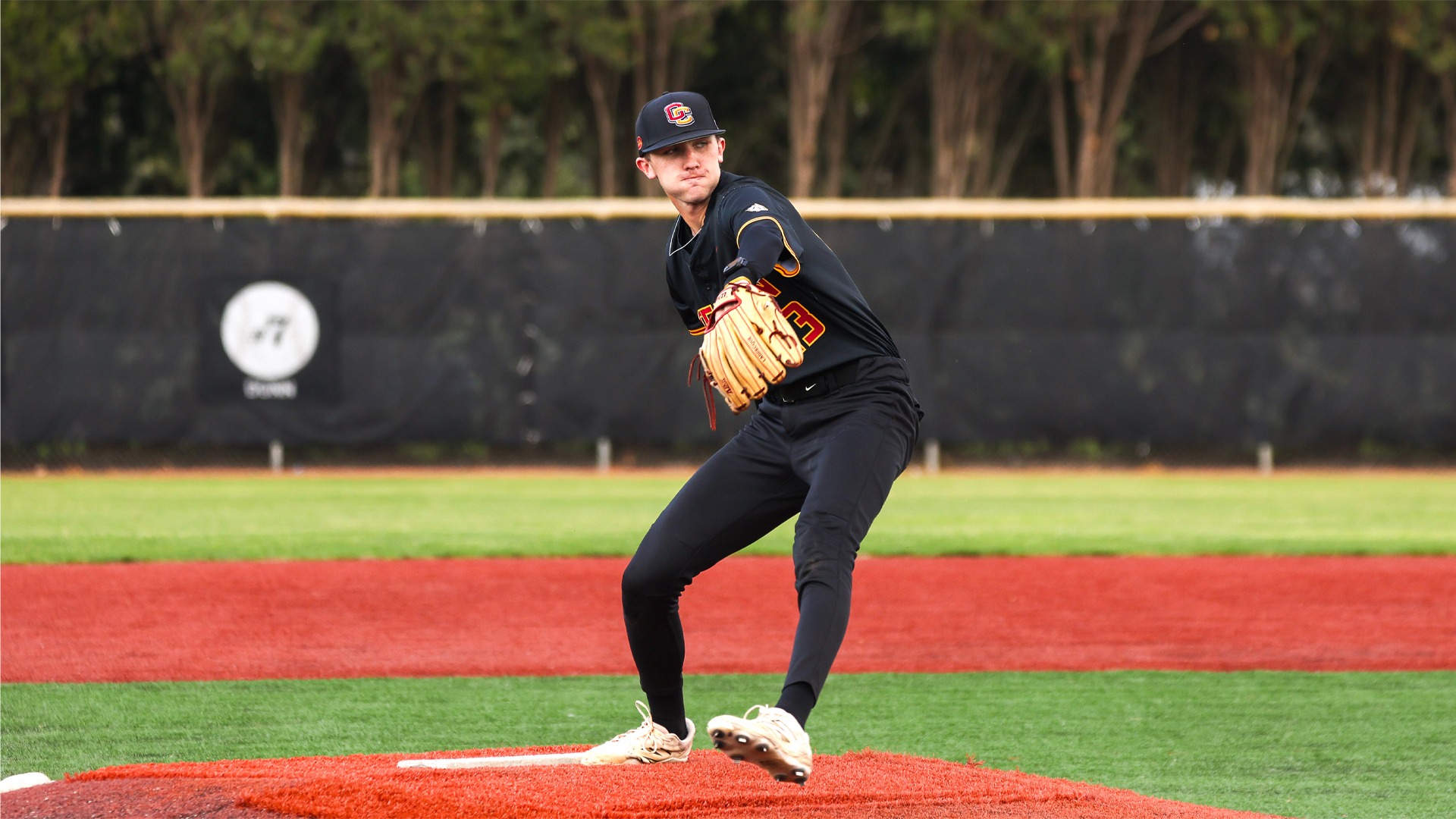 Sam Labrecque winding up to throw a baseball pitch
