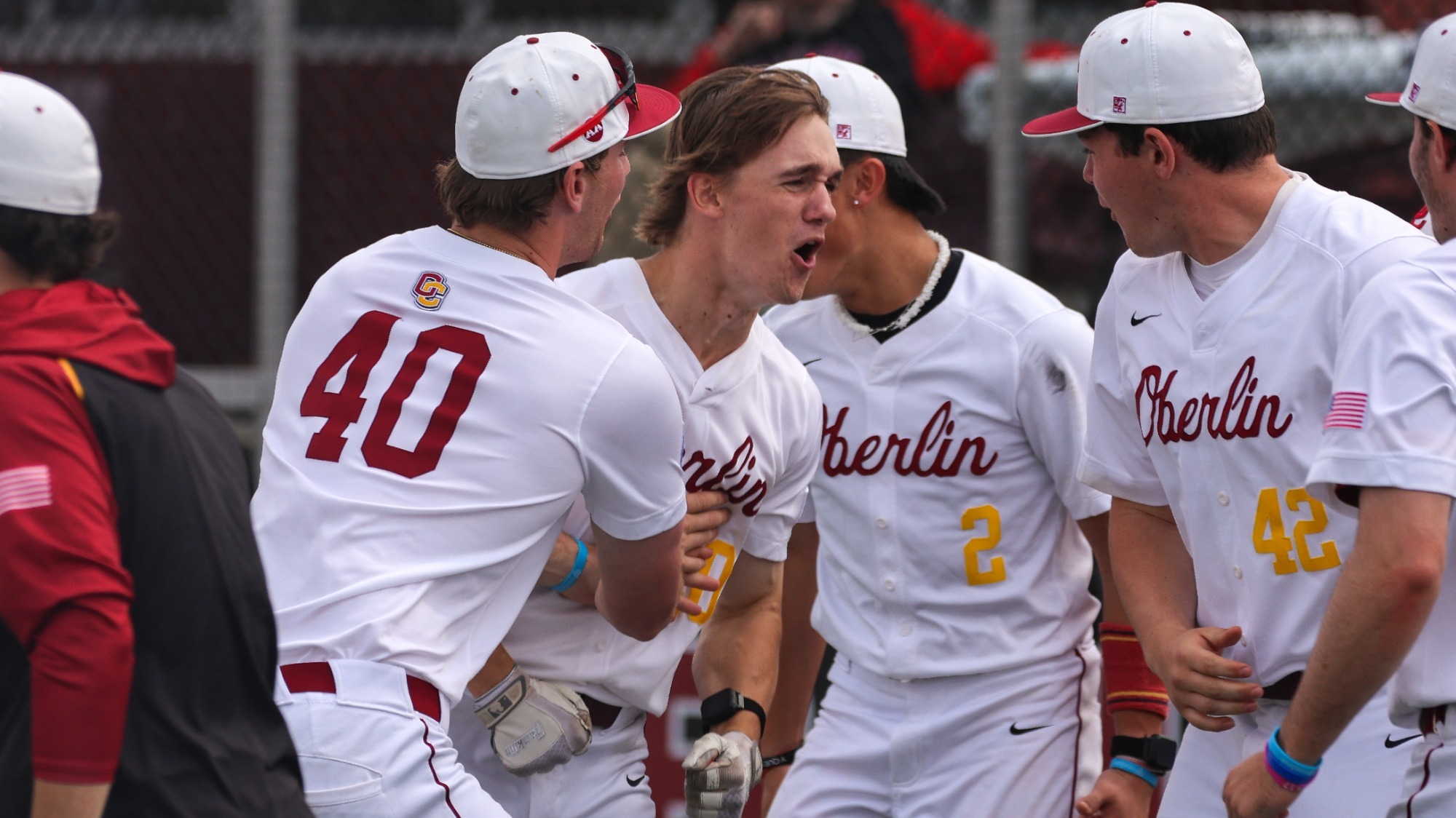 Patrick Leonard celebrating with team after hitting a homerun