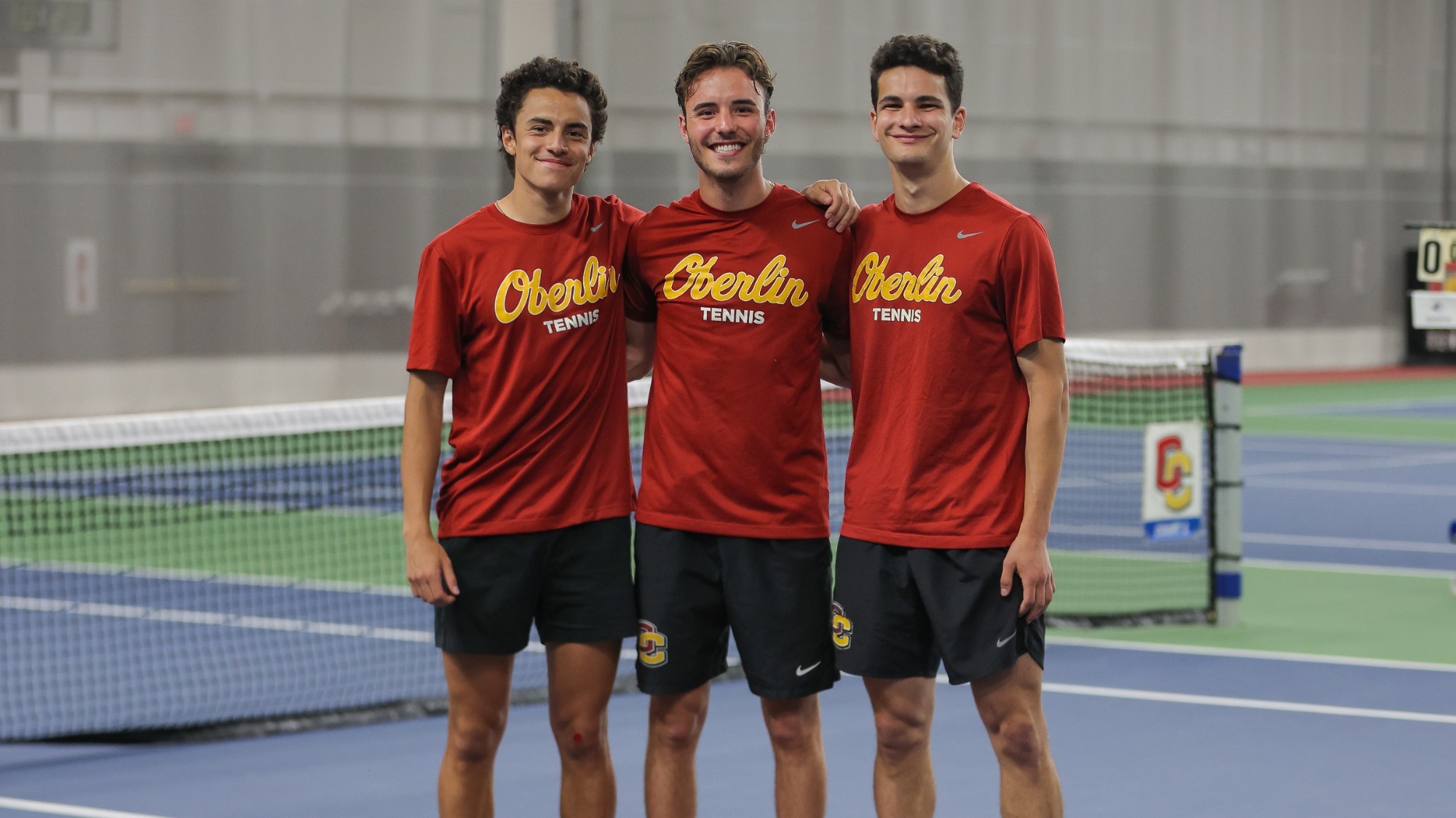 Sebastien Naginski, James Foster, and Shawn Lisann smiling for a senior photo