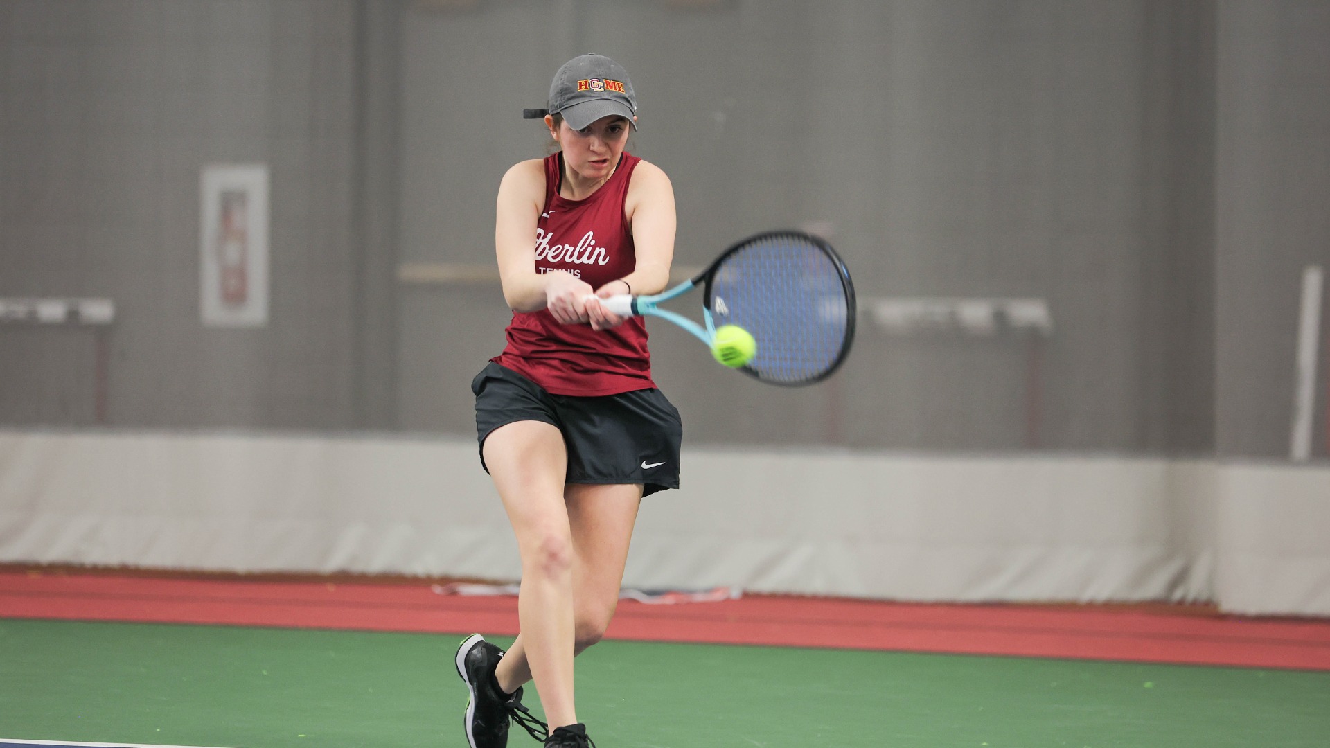Eva Lopez hitting the ball with a two-handed forehand stroke
