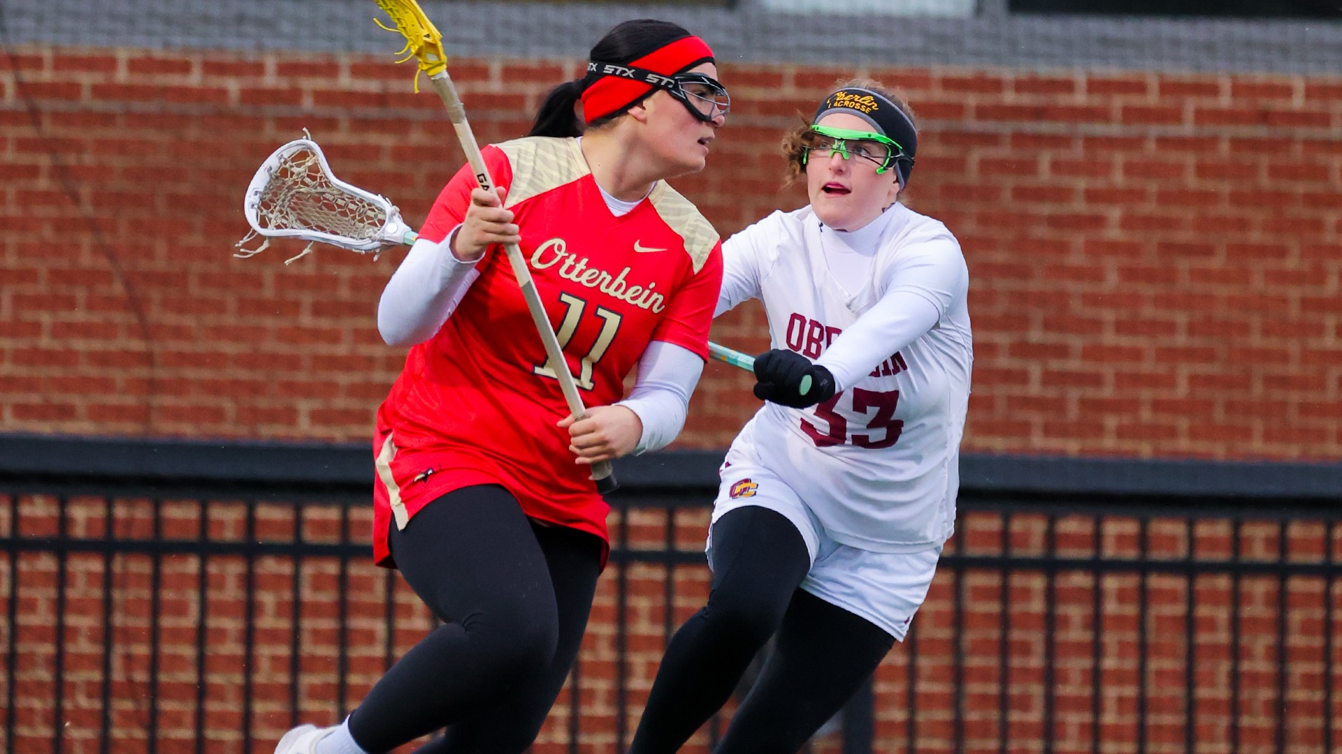 Rachel Reiter plays defense against Otterbein attacker