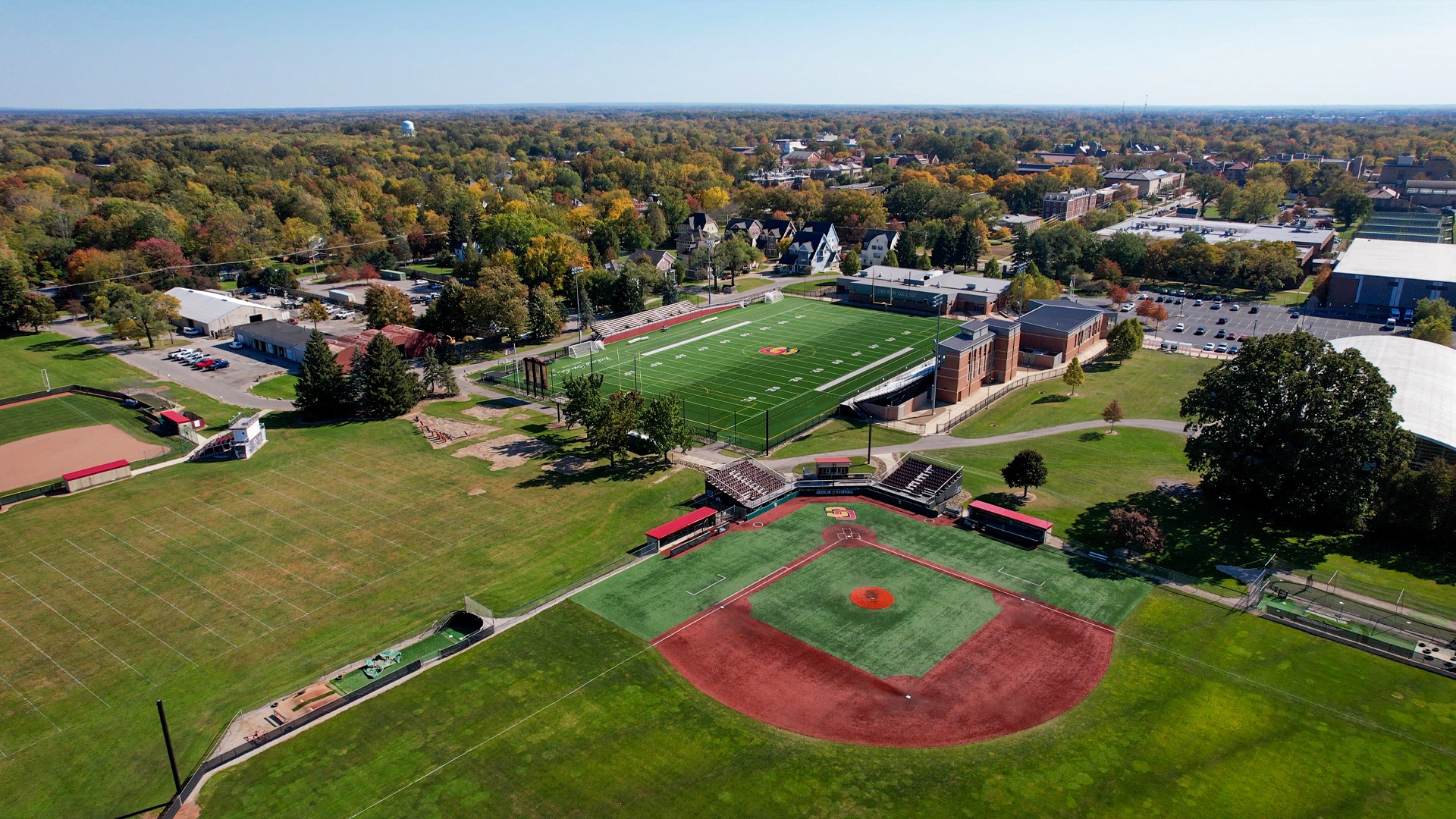 Drone shot of Dill Field and Bailey Field with Oberlin landscape in background