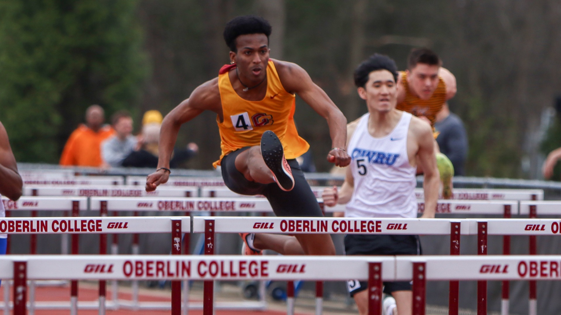 Namu Makatiani clearing a high hurdle