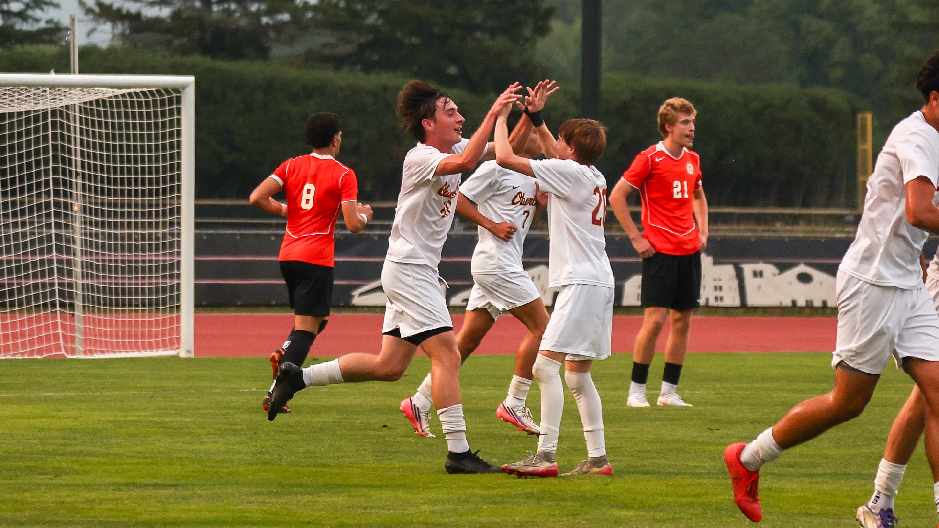 William Delovitch celebrates with Hudson Gazdak after scoring his first career goal