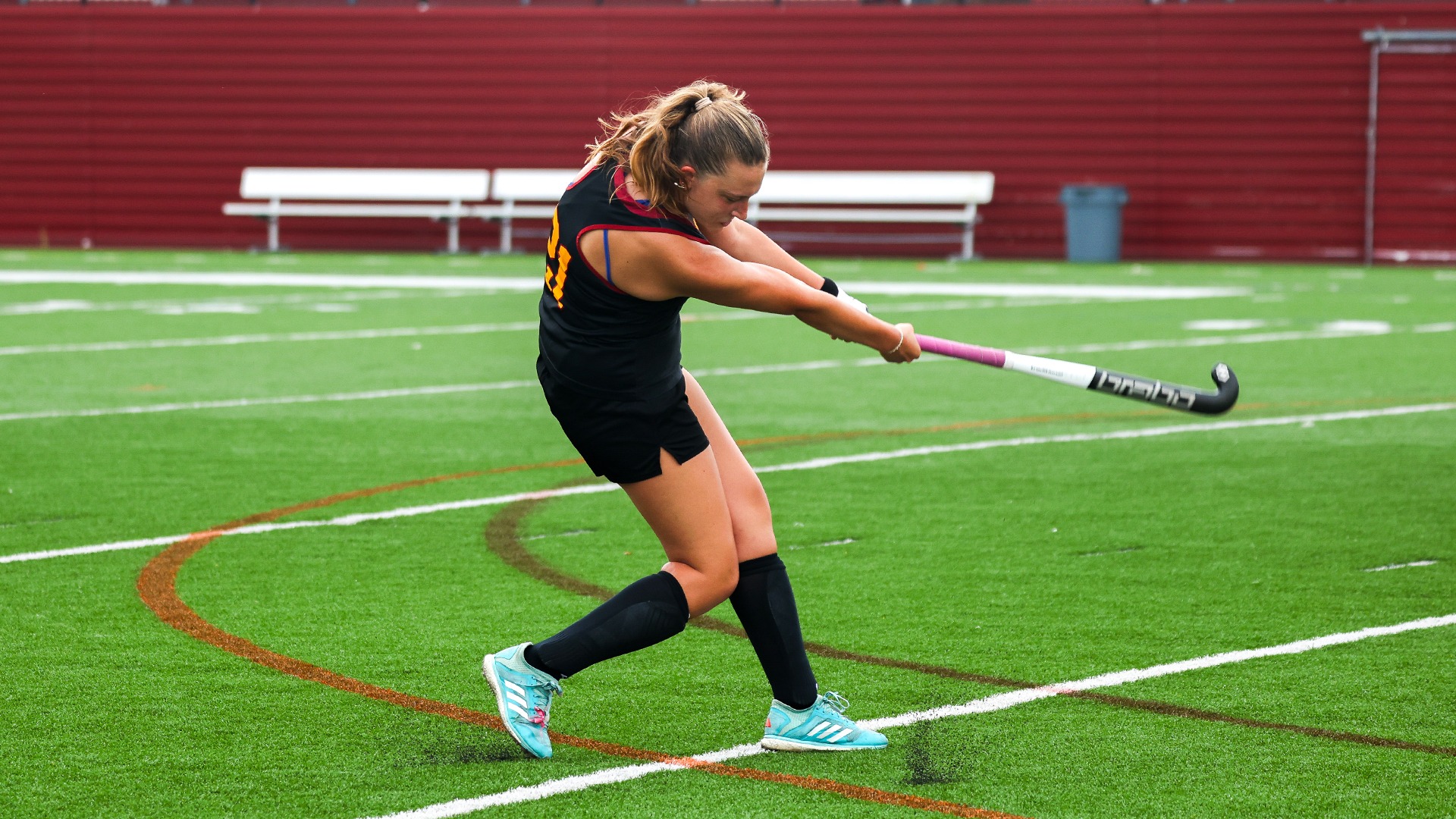 Shelby Roth hitting the ball to attempt a shot