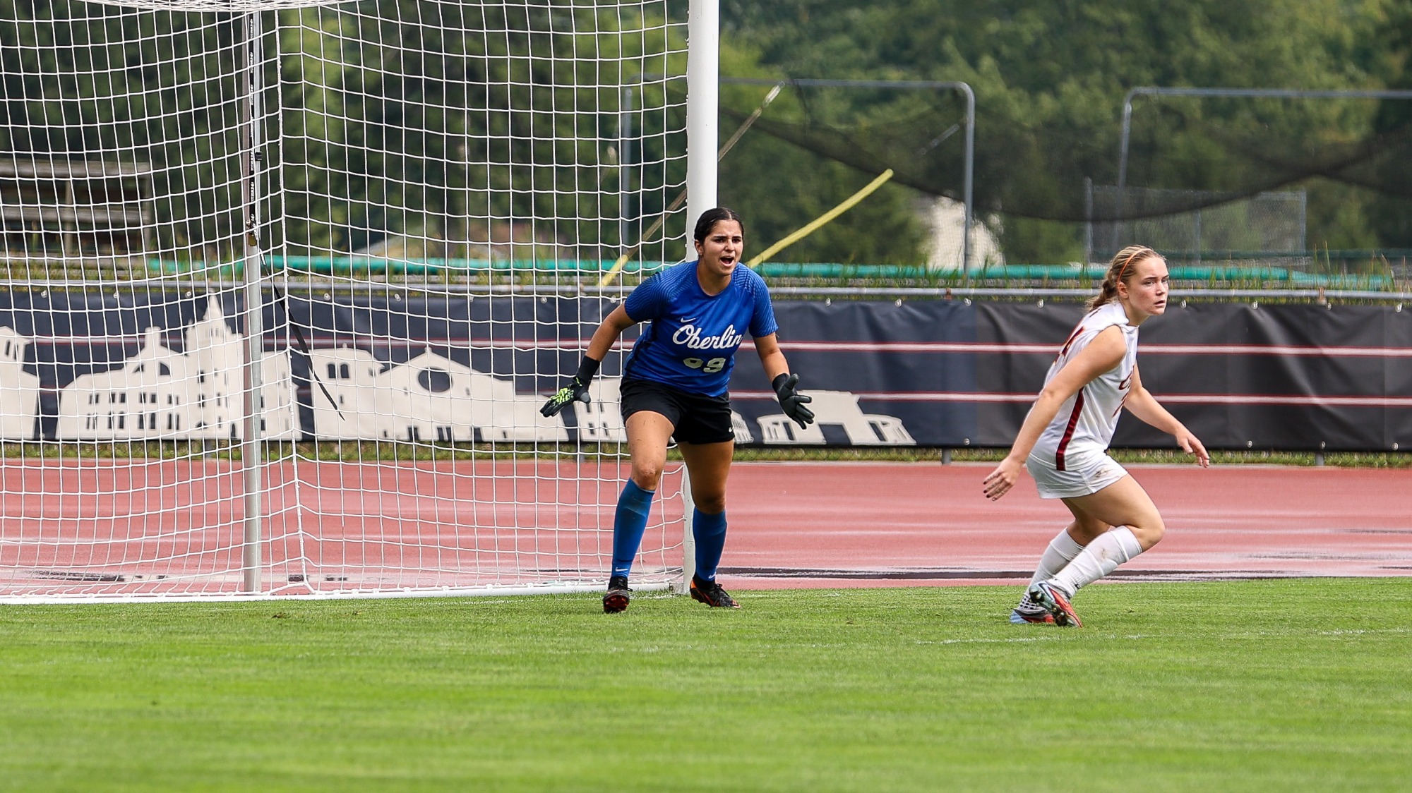 Asha Locke standing in front of the goal
