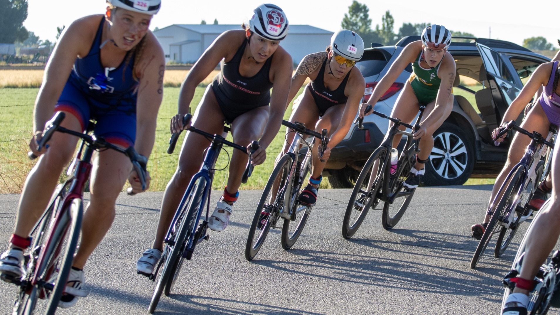 Alexa Magallon competes in the bike portion of the Desert's Edge