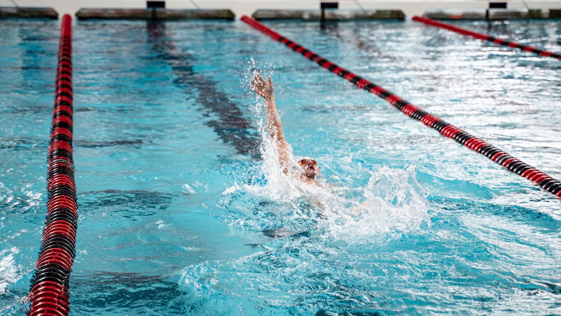 Swimmer doing backstroke