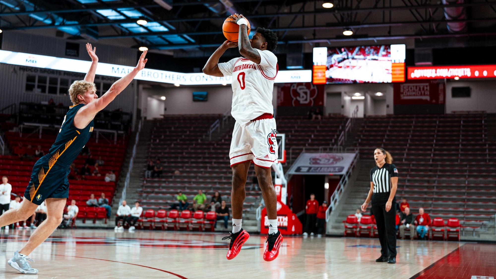 Jordan Crawford shooting a 3-pointer against Mount Marty 2025-26