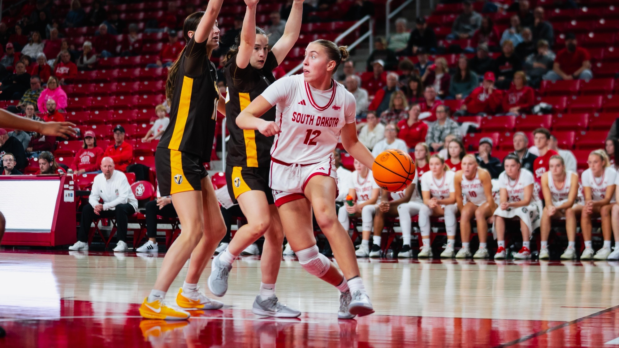 Alex Flattery looks to pass from under the basket inside the SCSC