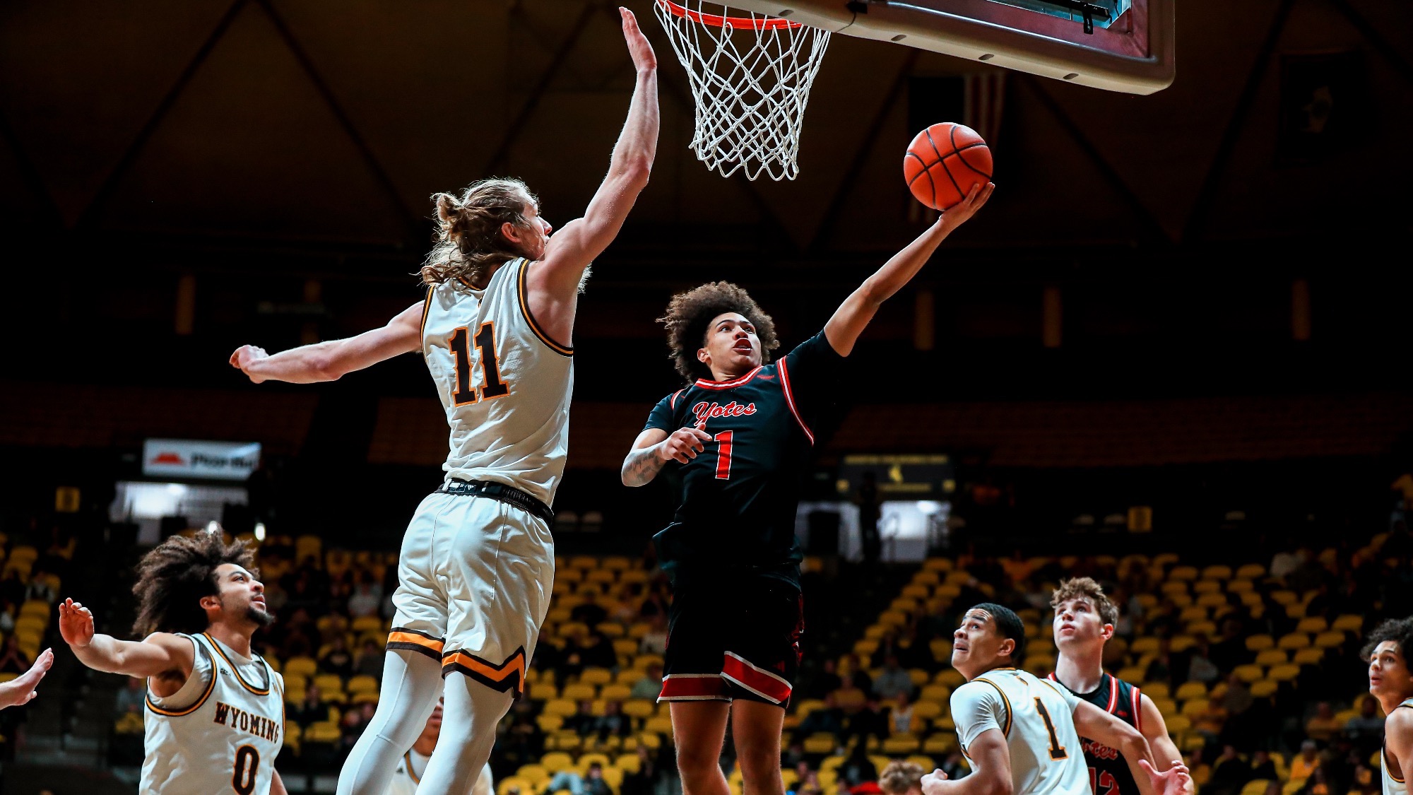 Uzziah Buntyn going up for a layup at Wyoming 12925