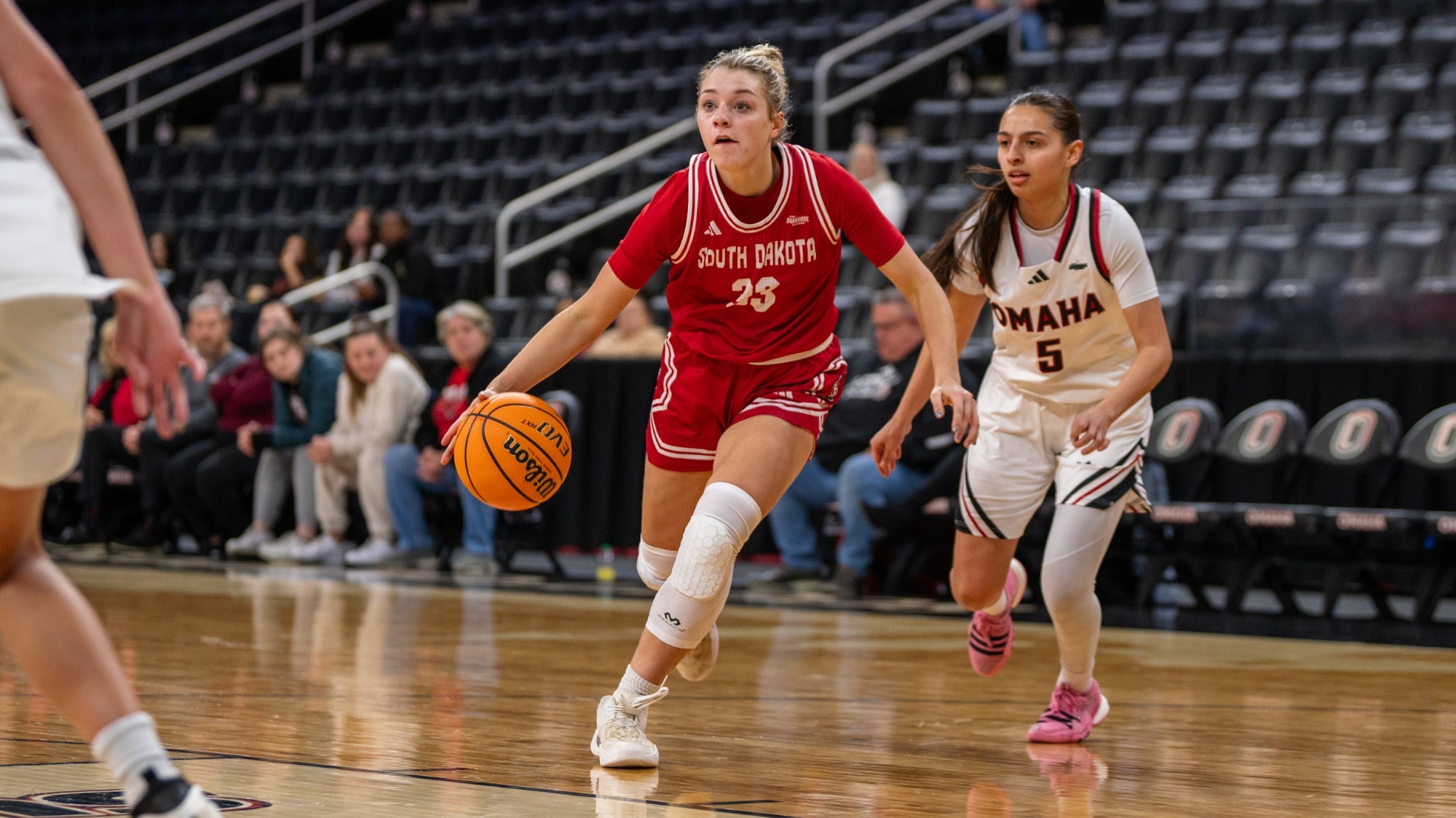 Tori Schlagel drives to the basket against Omaha in Baxter Arena