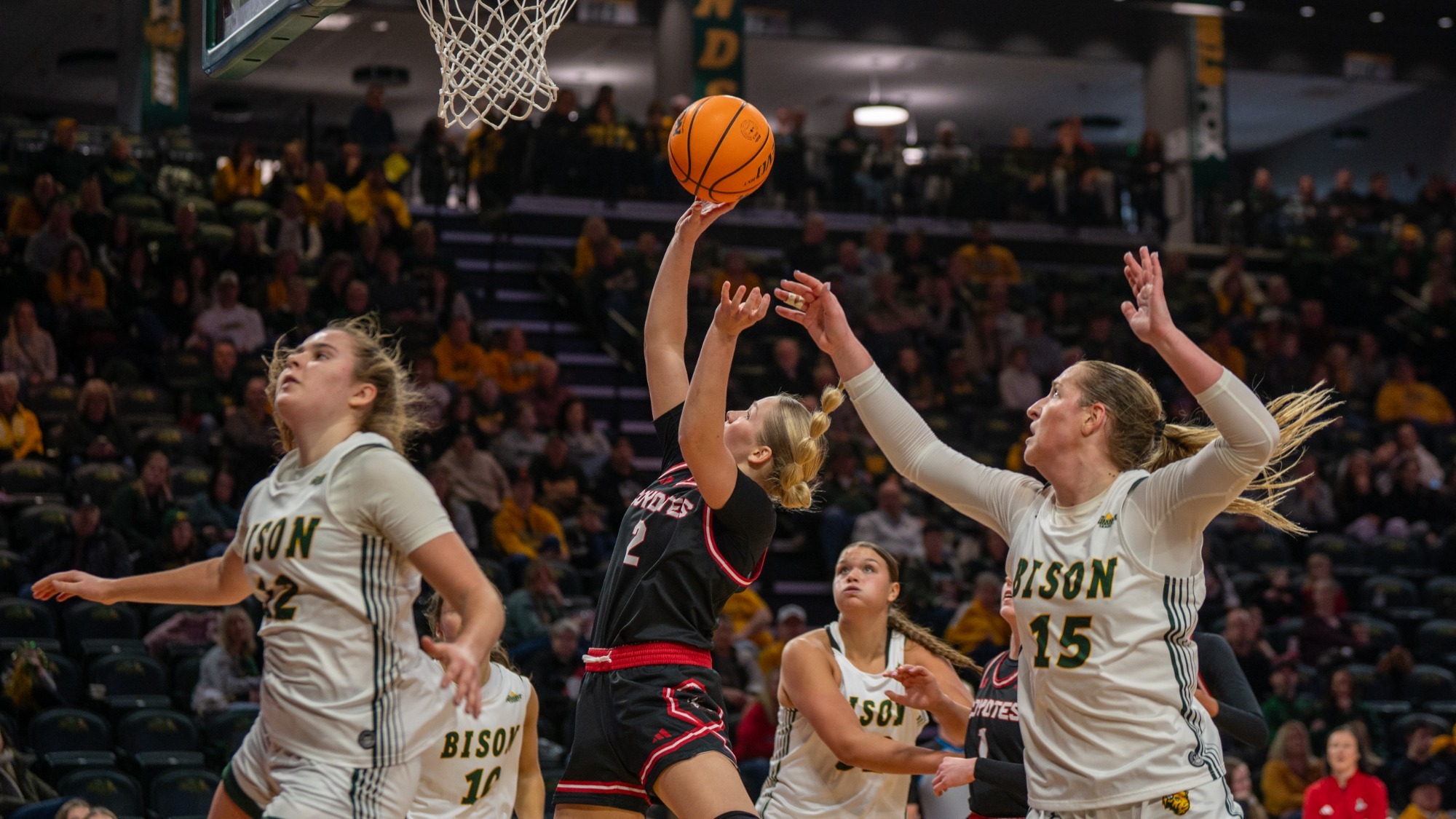 Jenna Hopp puts up a shot over NDSU defenders Saturday inside the Scheels Center