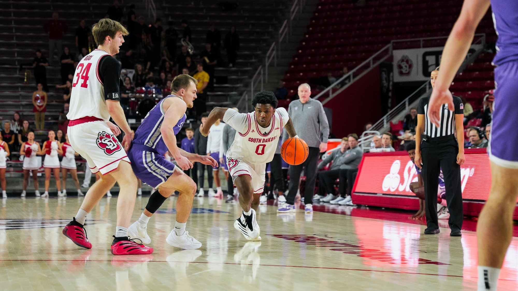 Jordan Crawford driving to the basket against St. Thomas 012426